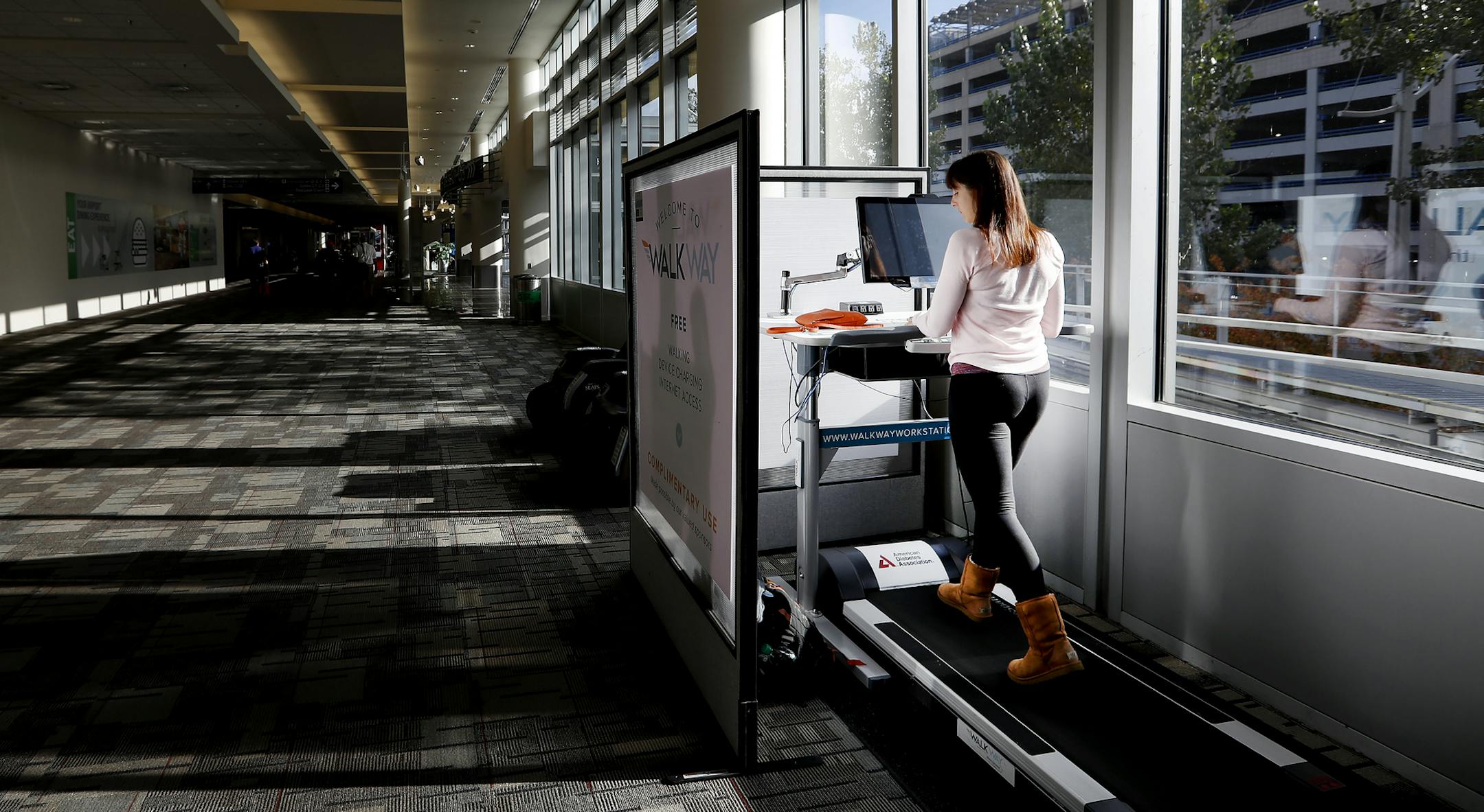 Kylie Naveau, 21, of Boise, ID used Walk Way a treadmill, desk and charging station in Concourse C during a 3 hour layover at the Minneapolis St. Paul International Airport. ] CARLOS GONZALEZ cgonzalez@startribune.com - October 19, 2016, Bloomington, MN, Minneapolis St. Paul International has long carried its weight amongst national airports. Now, with a flurry of hot new restaurants, shops and tap rooms descending. MSP
