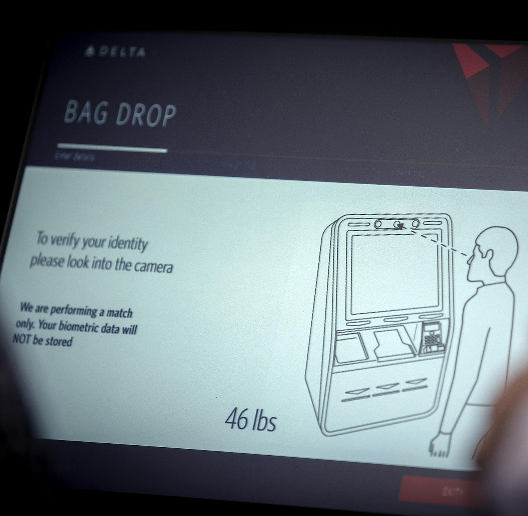 Delta Airlines' ticket agents help guide travelers through their new self-service bag drop machine at Minneapolis-St. Paul International Airport (MSP), Monday, June 19, 2017 in Bloomington, MN. The self-service bag drop machine is a $600,000 investment that allows customers to quickly, securely and easily check their own bags. Each machine will be equipped to test facial recognition technology to match customers with their passport photos through identification verification, a first for U.S. car