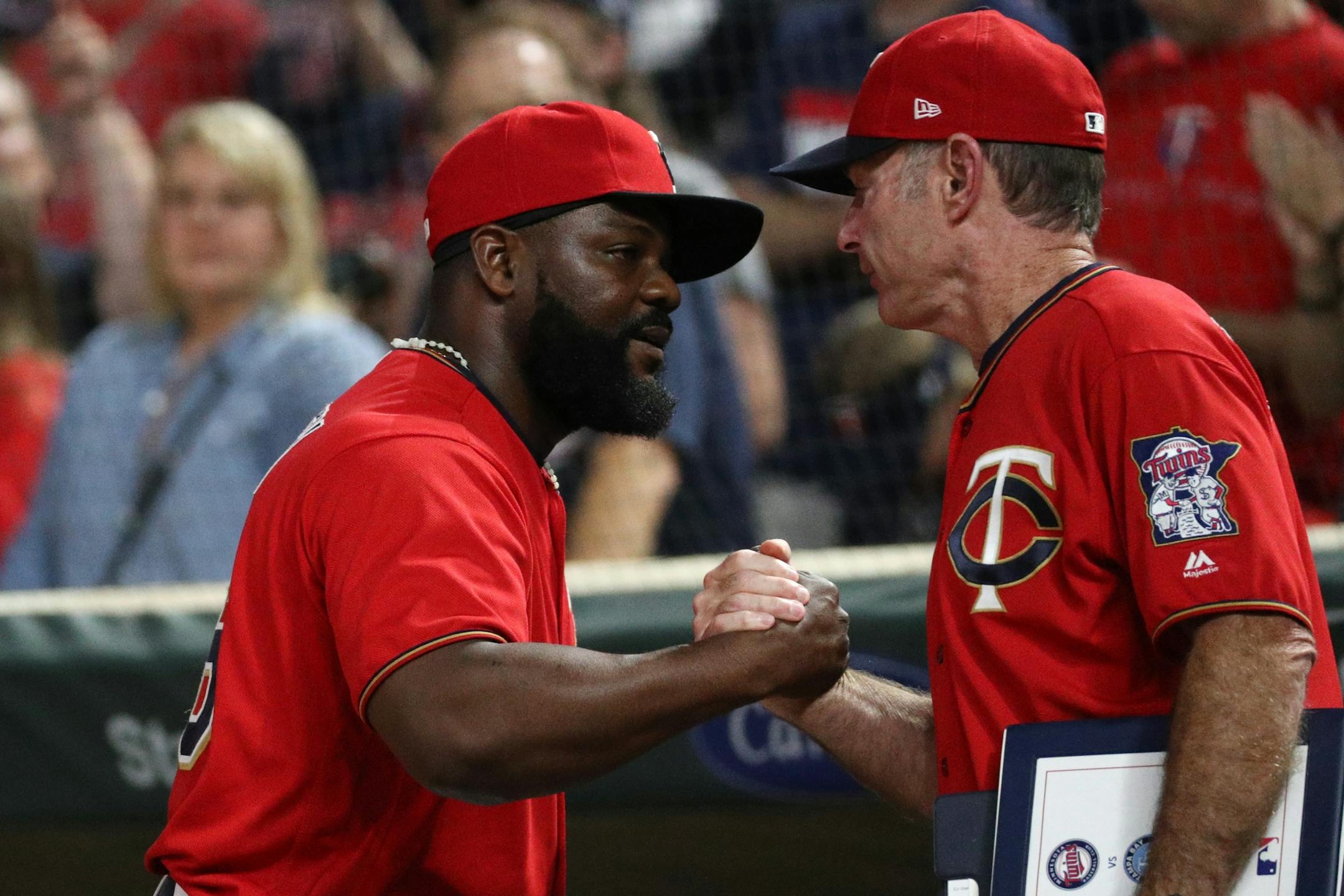 FormerTwins pitcher Fernando Rodney celebrated a win over the Tampa Bay Rays with manager Paul Molitor last month. Rodney was traded to Oakland on Thursday.