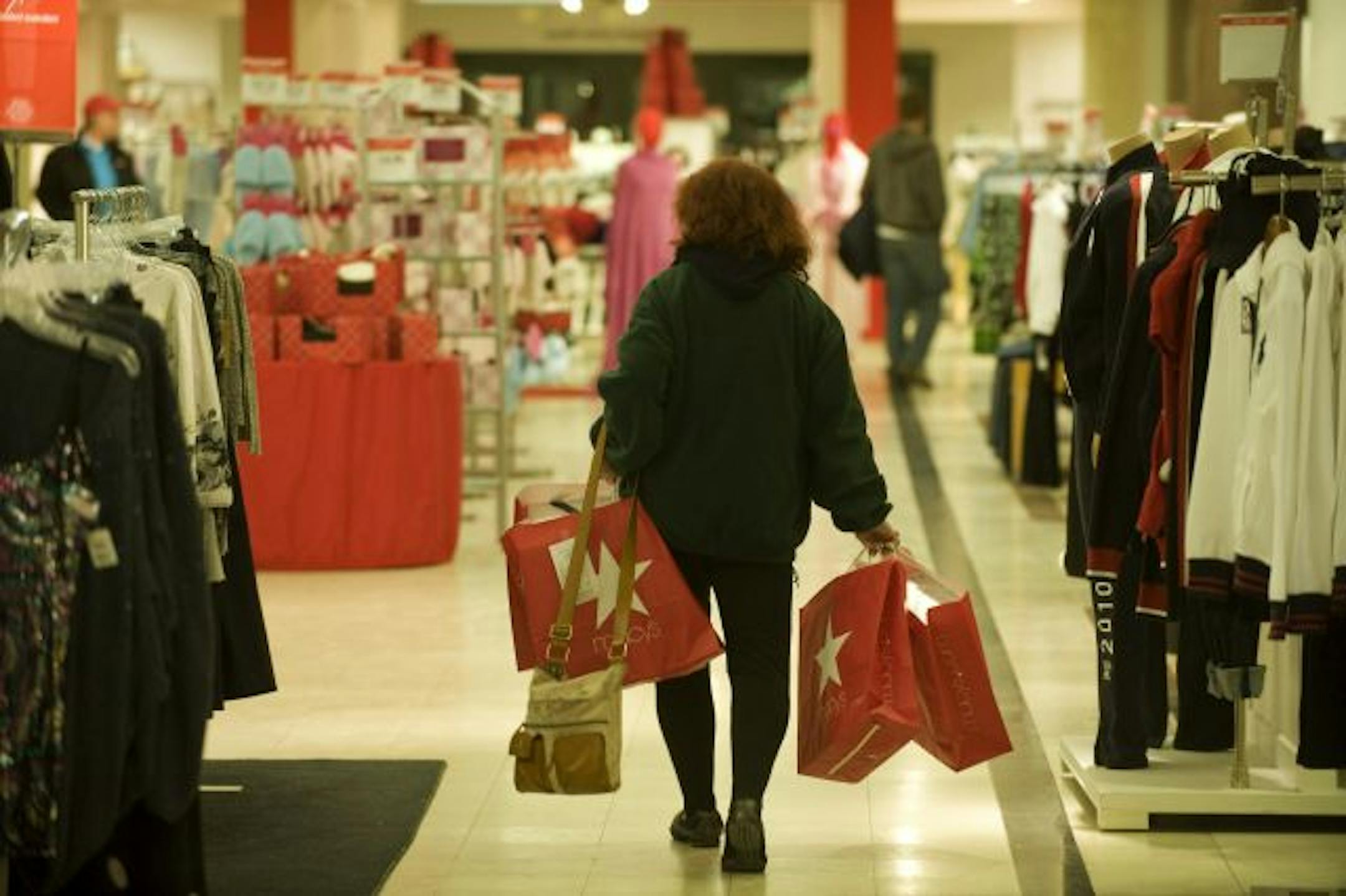 Macy's Rosedale is one of about a dozen Macy's across the nation that have decided to stay open for 83 hours straight to cater to busy shoppers. SEEN HERE: A late-night Macy's shopper with many bundles.