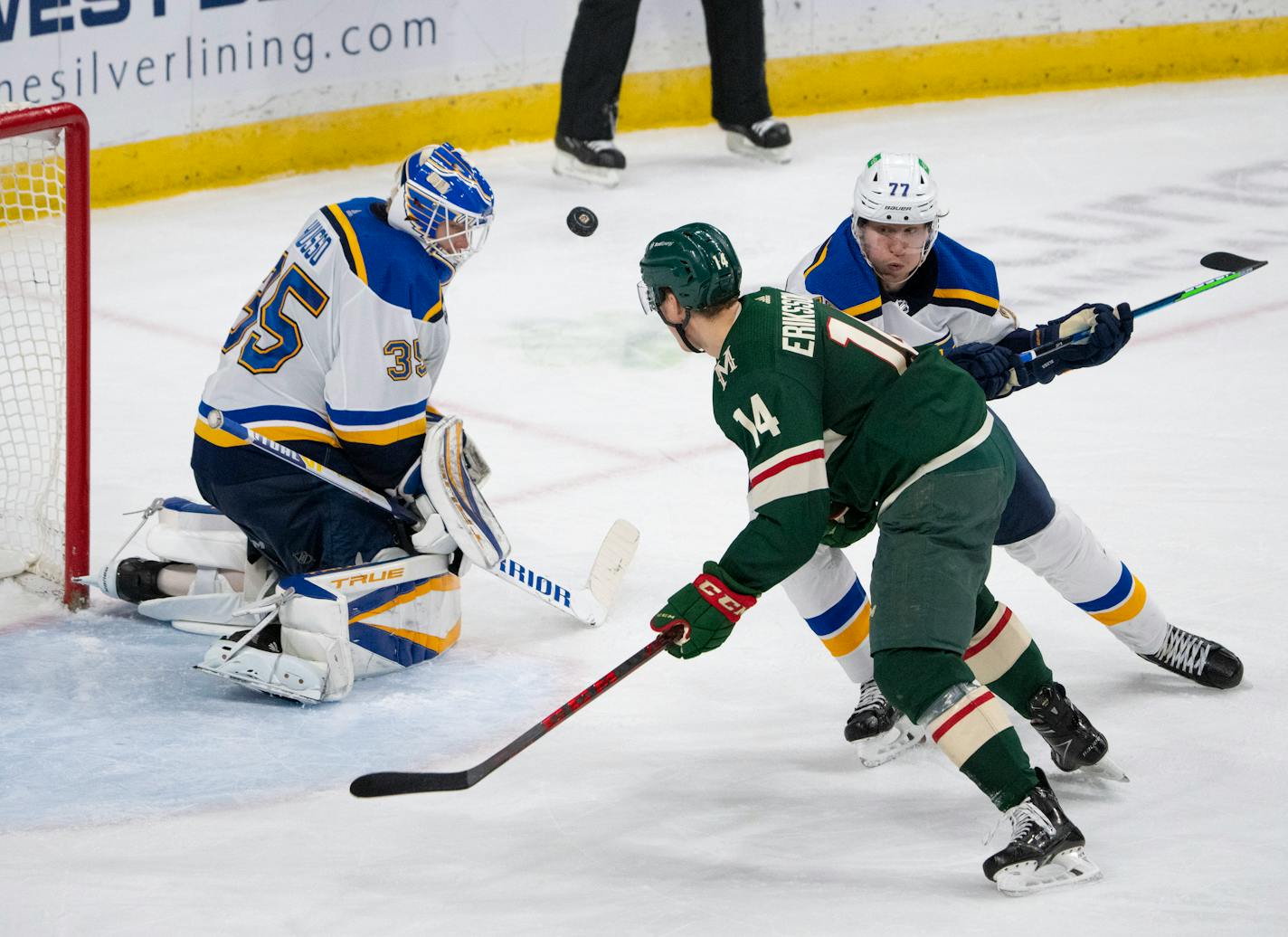 Wild center Joel Eriksson Ek eyed the rebound of a third-period shot off the pad St. Louis Blues goaltender Ville Husso