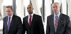 Former Minneapolis police officer Mohamed Noor, center, arrives for the first day of jury selection with his attorneys Peter Wold, left, and Thomas Pl