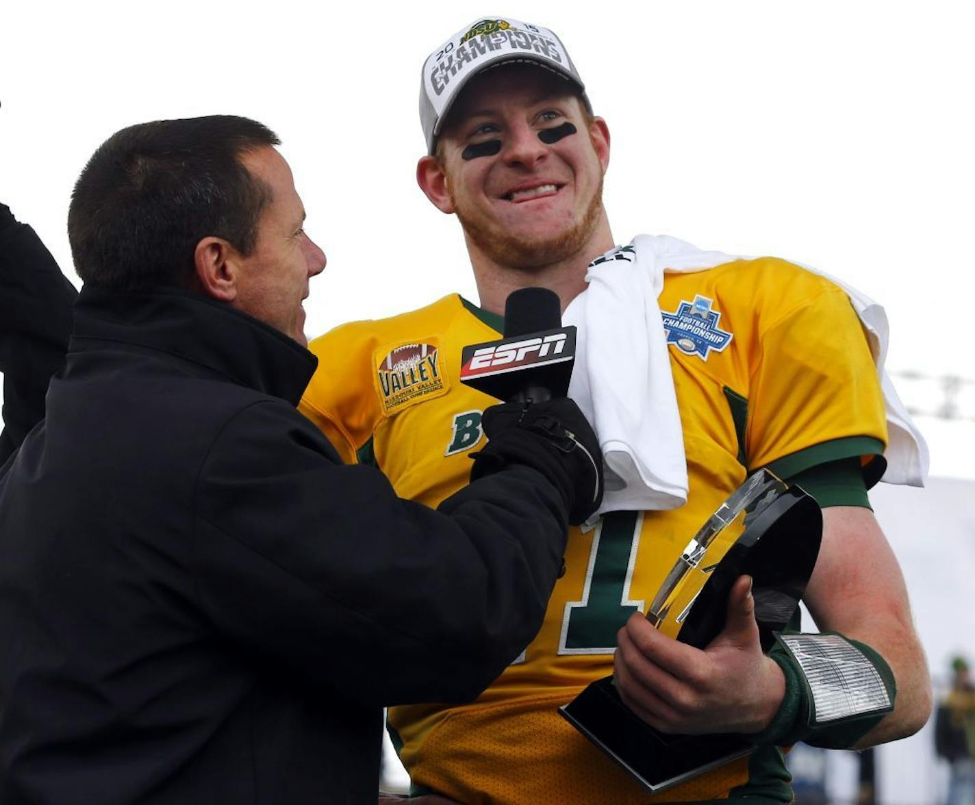 North Dakota State quarterback Carson Wentz (11) is interviewed during the FCS championship NCAA college football game between North Dakota State and Jacksonville State, Saturday, Jan. 9, 2016, in Frisco, Texas.