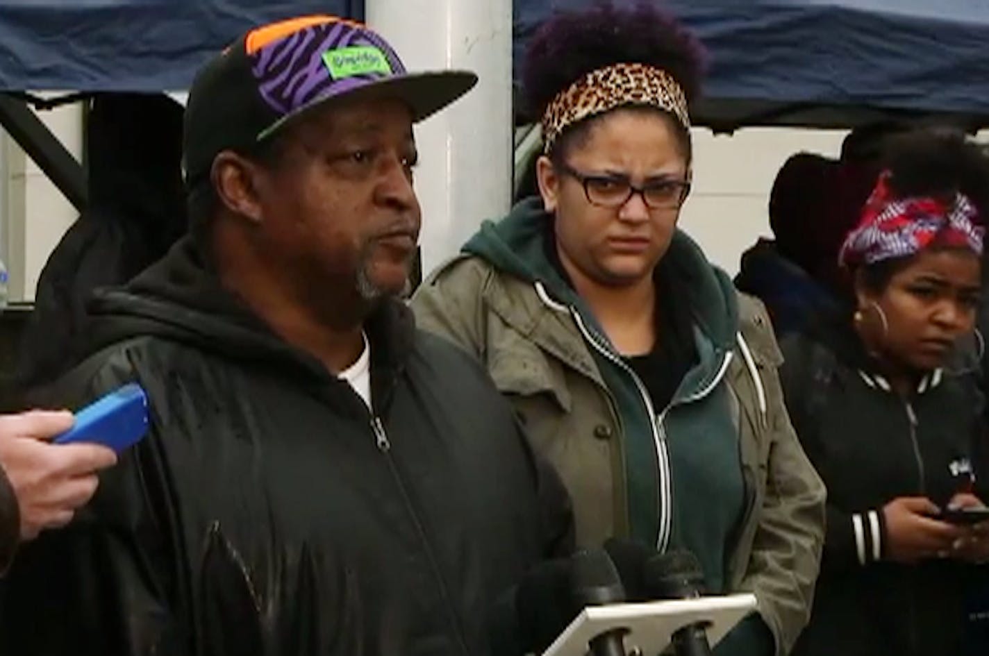 James Hill, father of Jamar Clark, speaks to the media Monday outside Minneapolis police fourth precinct.