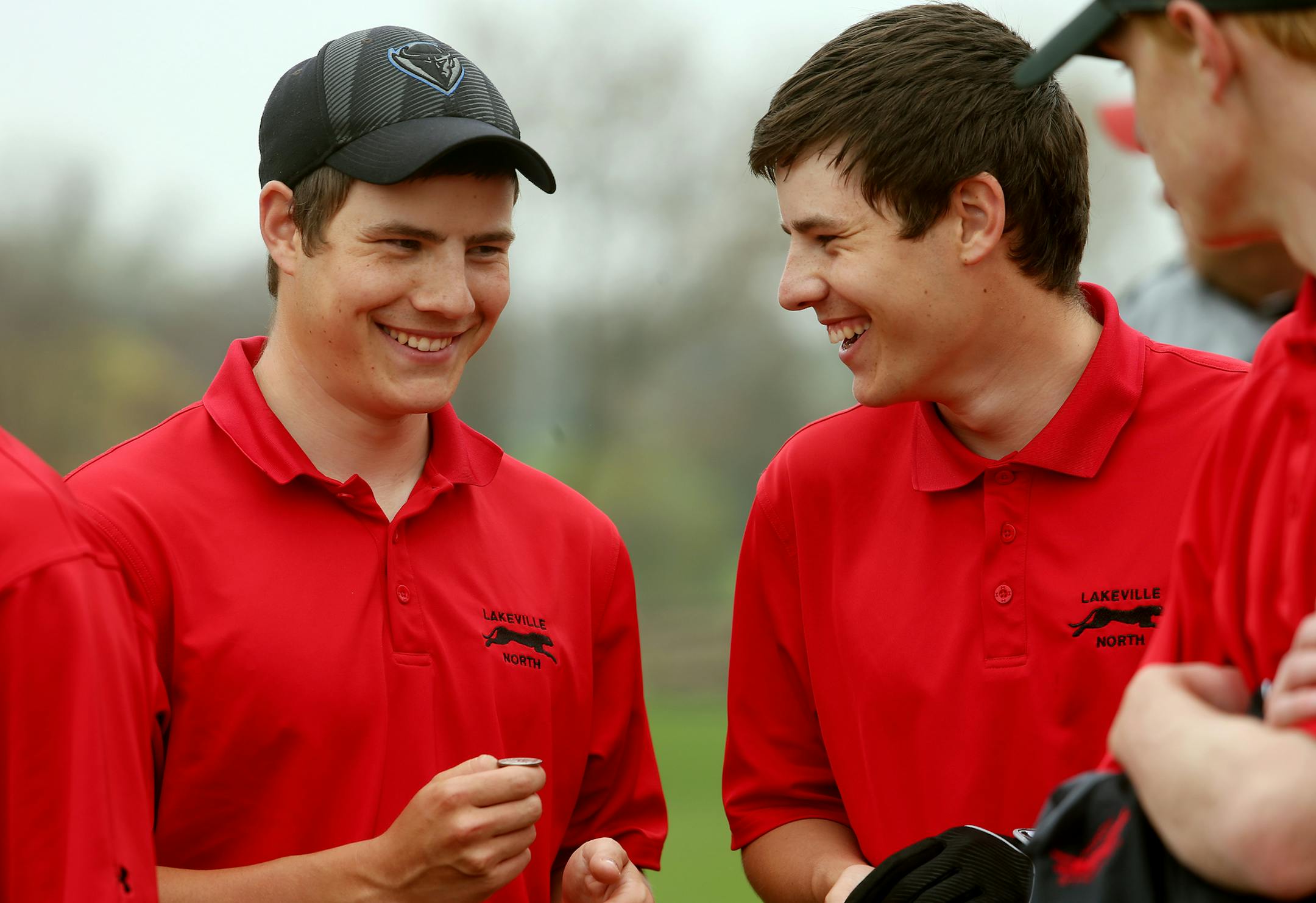 Lakeville North golfers Bobby Thomas (left) and Freddy Thomas (right) share a laugh before a meet at Brackett's Crossing Country Club. ] JOELKOYAMA‚Ä¢jkoyama@startribune Lakeville, MN on May 12, 2014.