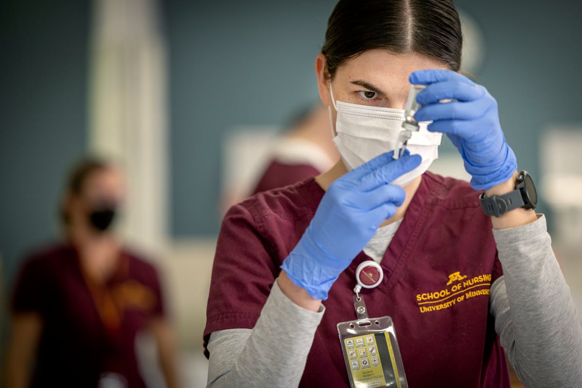 First year nursing student Mallory Willett practices drawing insulin during a class at the University of Minnesota in Minneapolis.