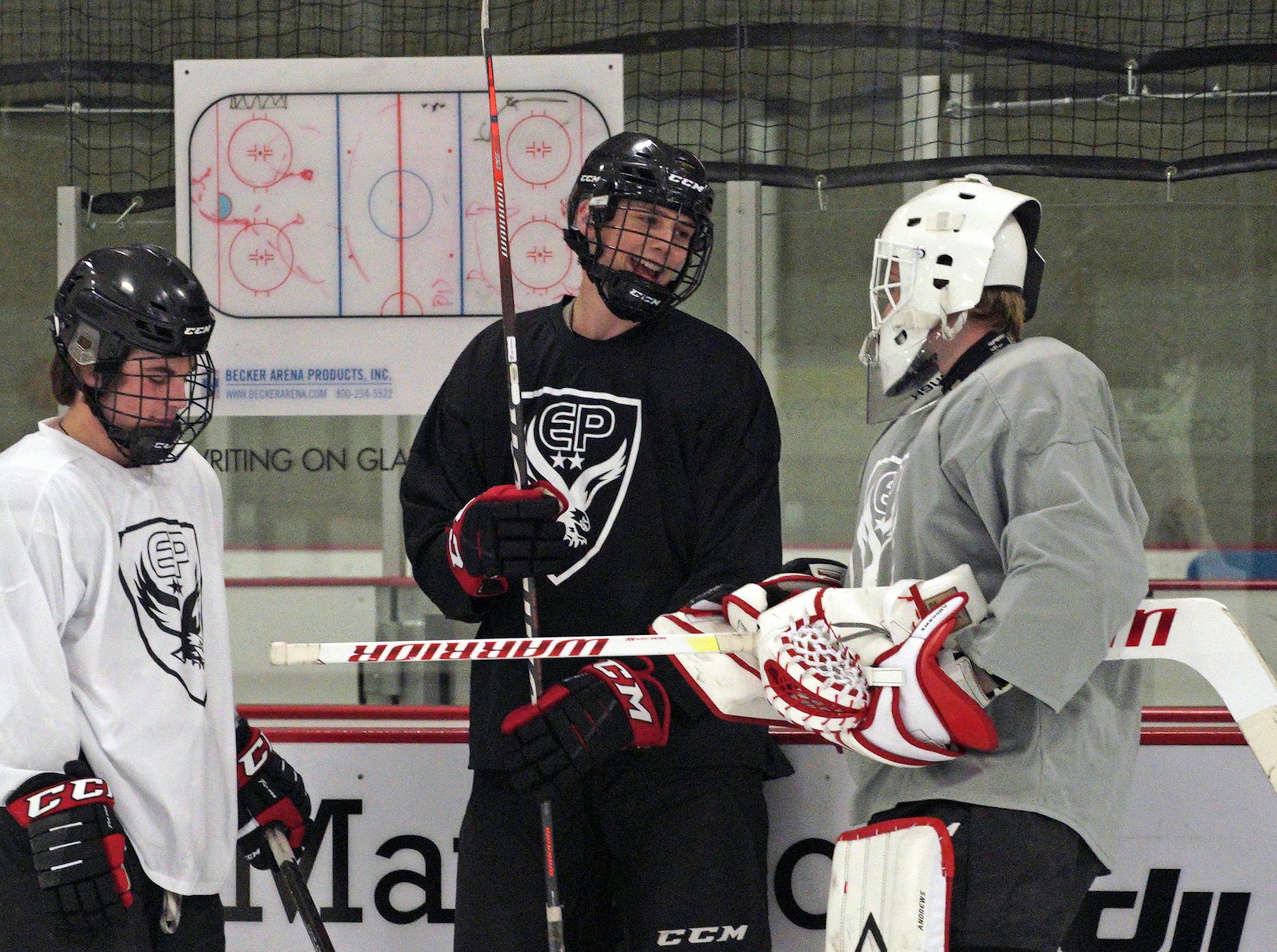 Mason Langenbrunner (center) joined the Eden Prairie this year after playing for Cloquet. His father, a former NHL player, took a new job that brought the family to the Twin Cities."There's been a little bit of myself that's been lost in the move,'' Mason said. "But at the same time, I've enjoyed getting to know these guys. It's been a great fit." Photo: Brian Peterson * brian.peterson@startribune.com