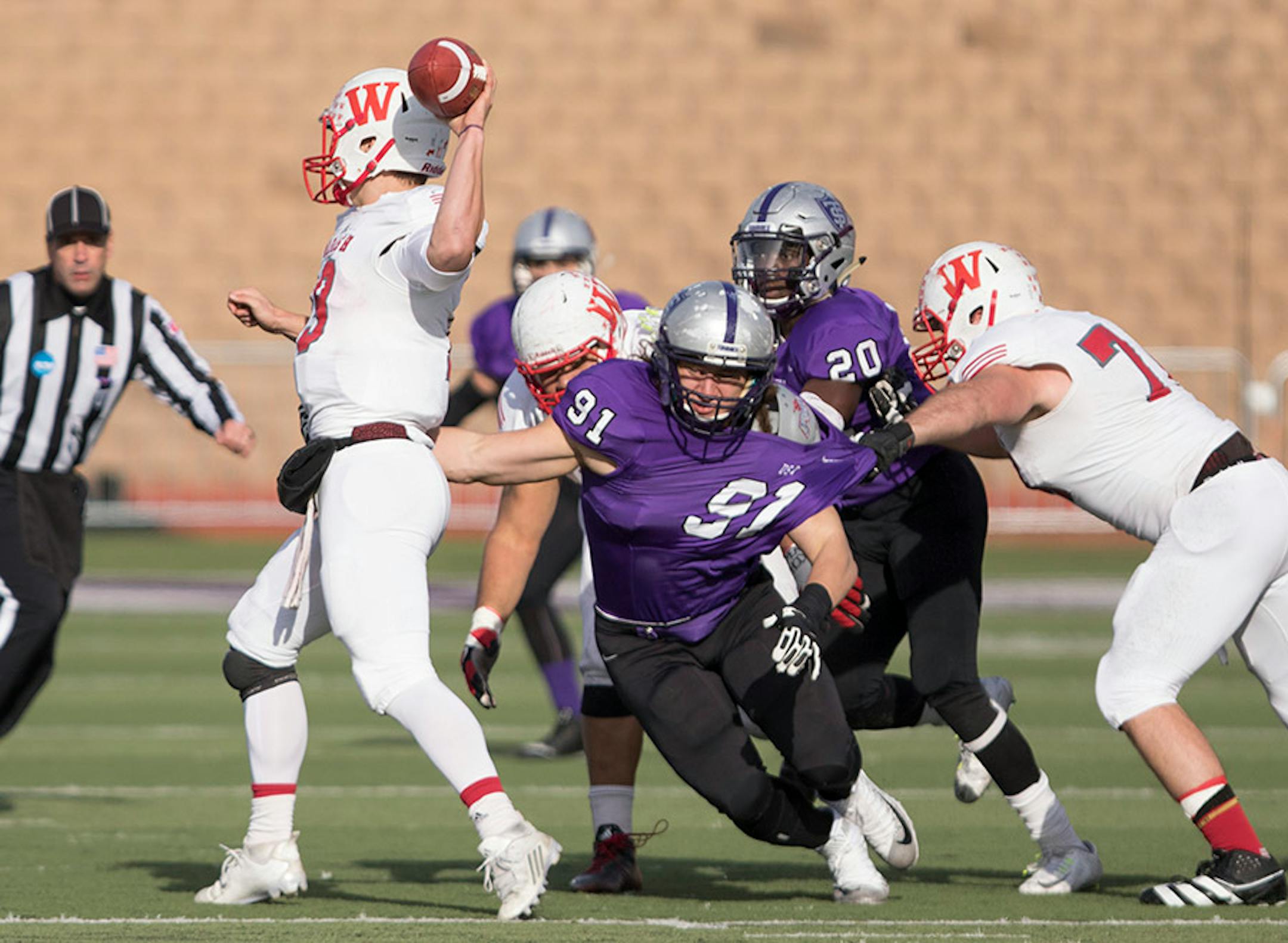 St. Thomas defensive lineman Austin Jochum (91) provided pressure on Wabash QB Connor Rice (19) as the University of St. Thomas Tommies hosted the Wabash College Little Giants on December 5, 2015.