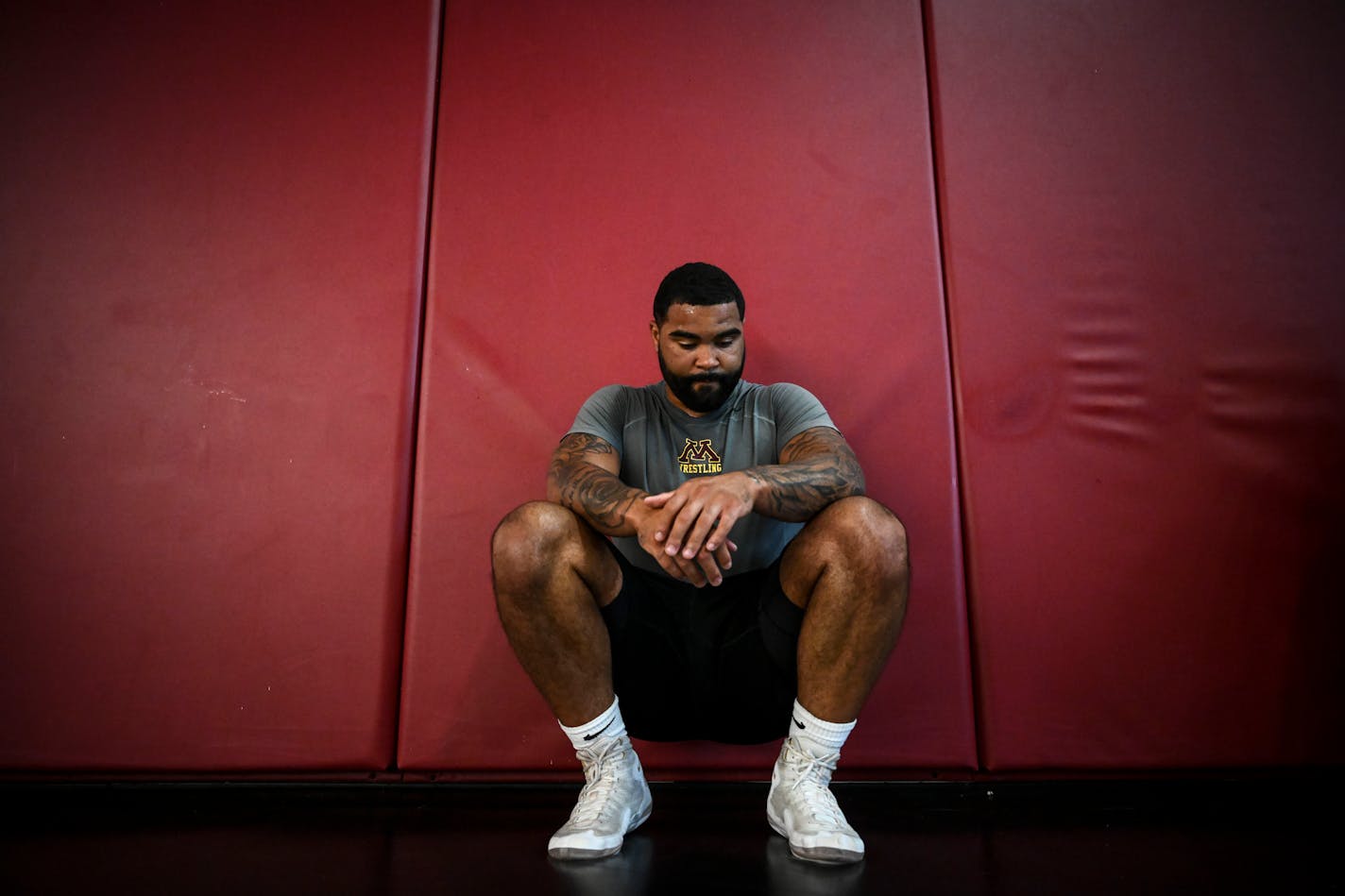 Gophers wrestler Gable Steveson rested between sparring sessions during Thursday's workout.