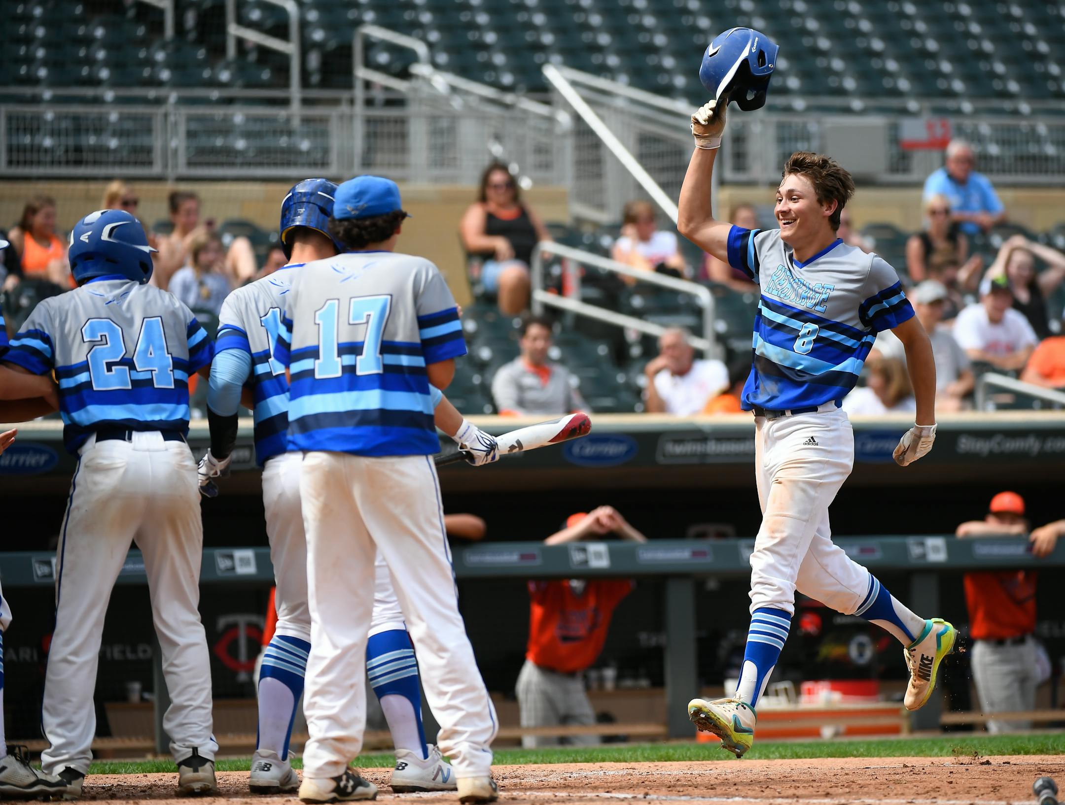 Heritage Christian Academy pitcher Seth Halvorsen, right, hit a three-run homer in the bottom of the fifth inning, his second of the game, against Sleepy Eye in the Class 1A championship game Saturday.