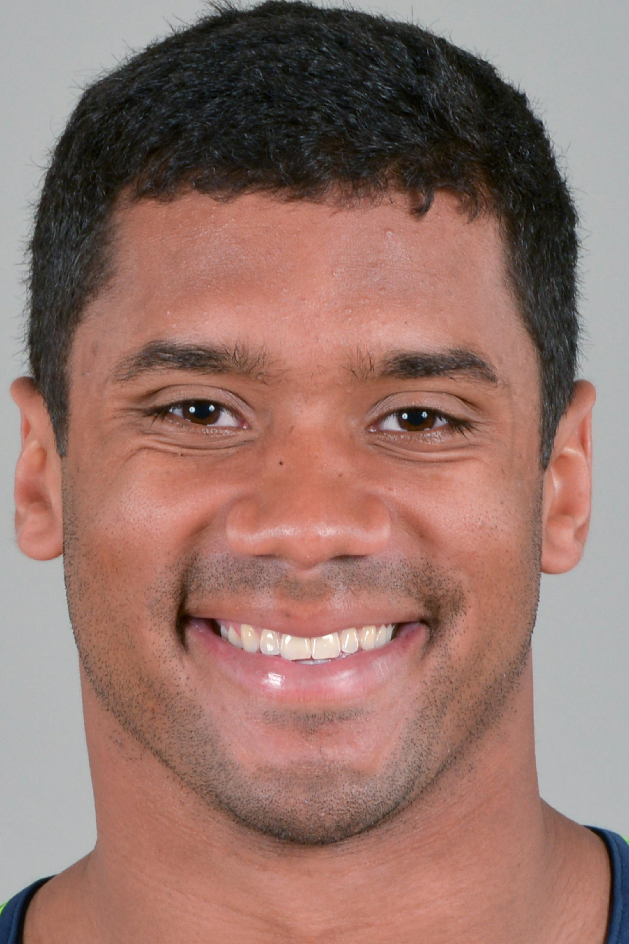 This is a 2013 photo of Russell Wilson of the Seattle Seahawks NFL football team. This image reflects the Seattle Seahawks active roster as of Wednesday, May 29, 2013 when this image was taken. (AP Photo) ORG XMIT: NFLHS13