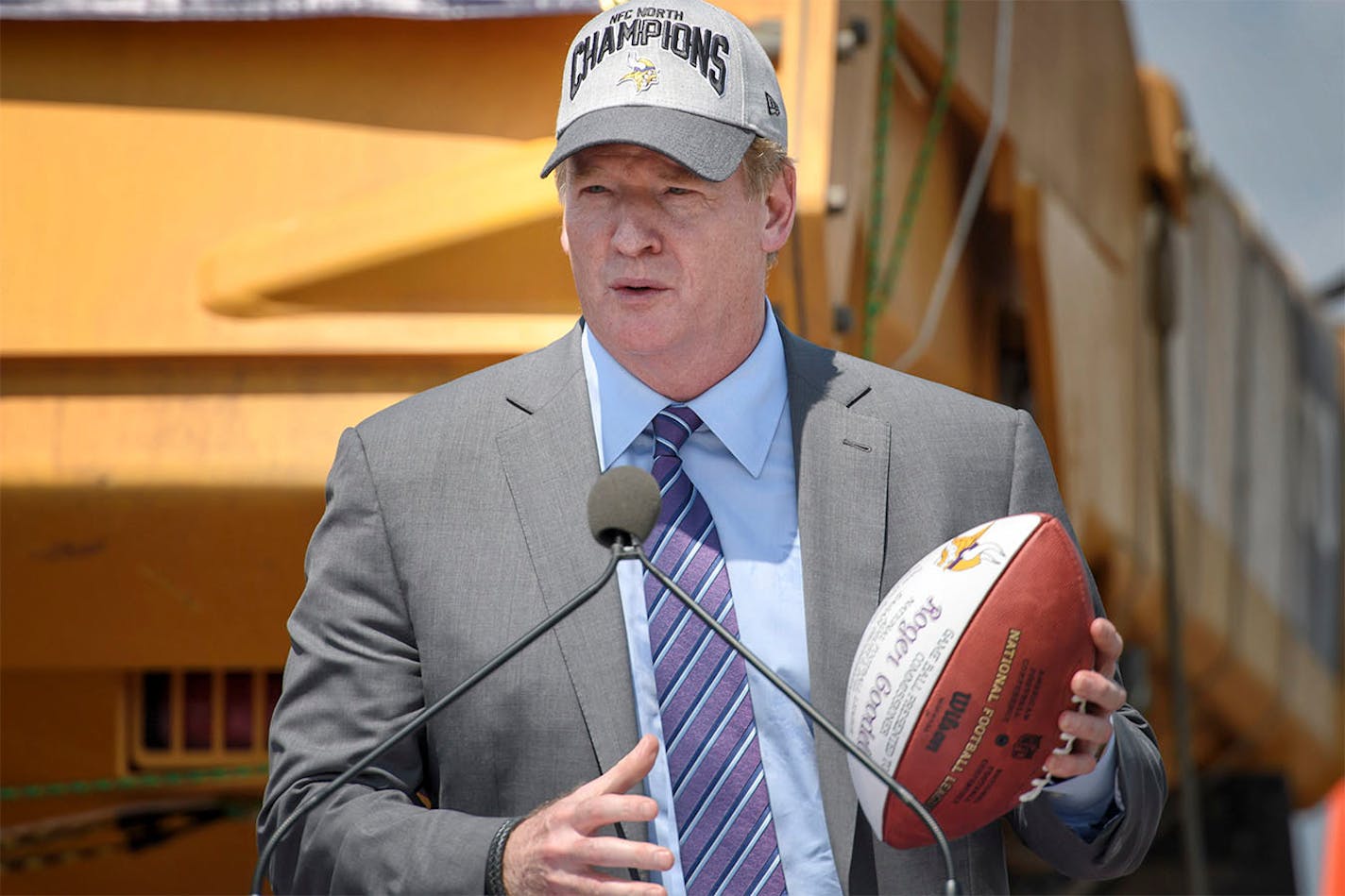 NFL Commissioner Roger Goodell received a commemorative football from the Wilfs to thank him for his support.