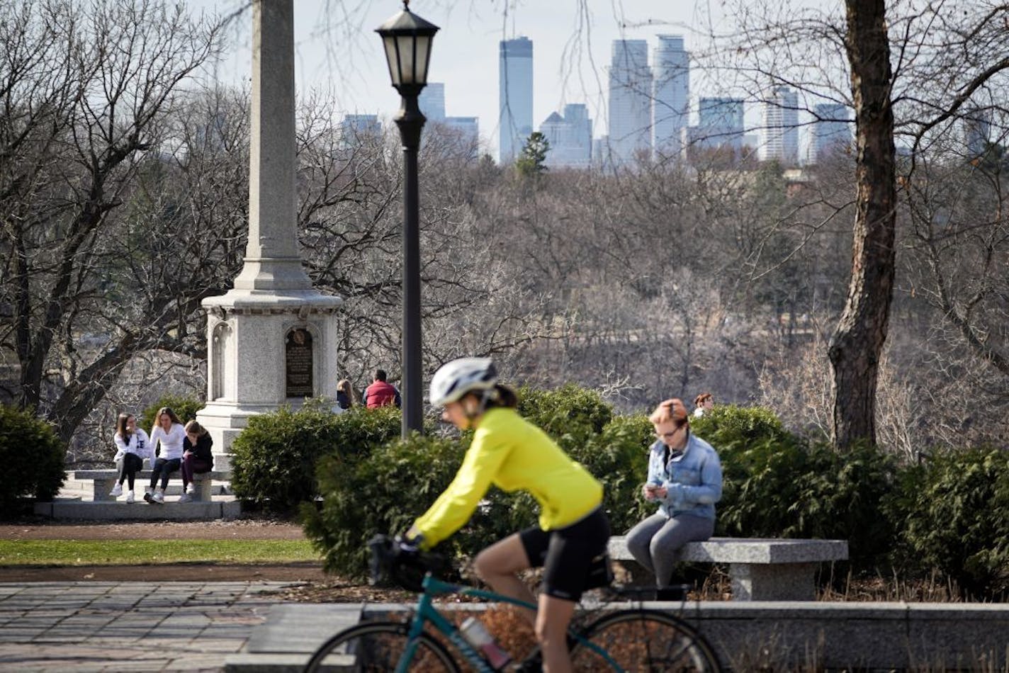 Bikers, joggers and pedestrians struggled to keep their distance as they enjoyed the sun and warm temperatures near the Monument on the west end of Summit Avenue along Mississippi River Boulevard in St. Paul on Sunday, April 5.