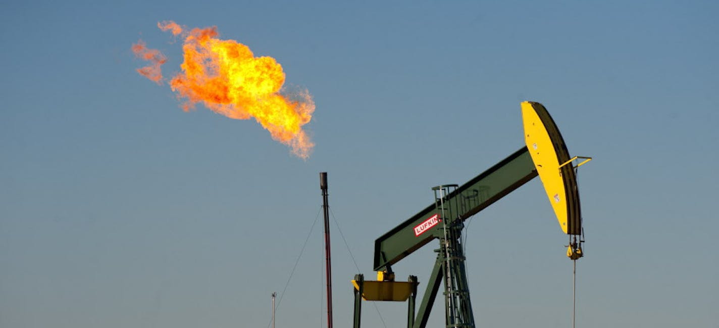 Natural gas is burned off at an oil well east of Williston, North Dakota. Until pipelines are completed gas has to be burned instead of gathered for sale and distribution ] GLEN STUBBE * gstubbe@startribune.com