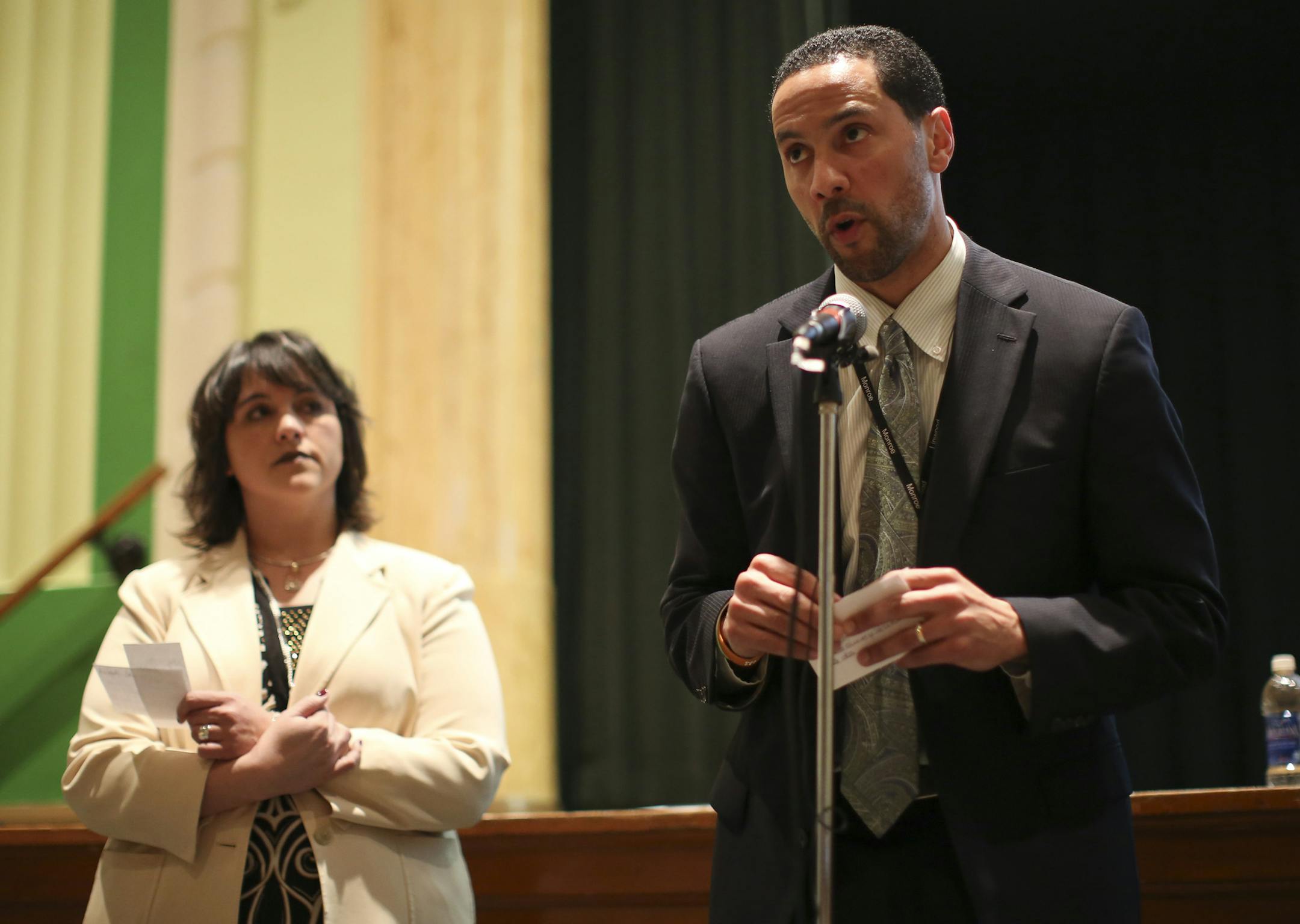 Linwood Arts Principal Bryan Bass answered a question from a parent at the forum. At left was Christine Osorio, an assistant superintendent in the district. ] JEFF WHEELER • jeff.wheeler@startribune.com Parents vented concerns and questions Monday night, March 24, 2014 about a custodian at Linwood Arts Plus Elementary who allegedly peeked at a boy in a bathroom stall. The meeting was held at the St. Paul school.