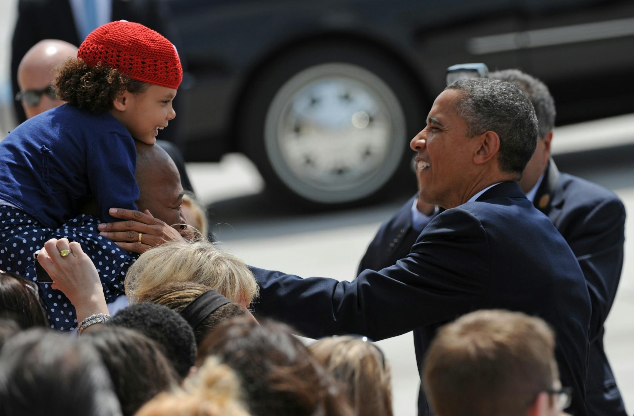 President Barack Obama arrived at the Minneapolis-St. Paul International Airport Air Reserve Station on Friday morning June 1, 2012. President Obama reached out to say hello to Randy Hobbs of St Louis Park wh was holding his 5 yr old daughter Isabella Hobbs. Her father say's that she is a huge fan of the president.