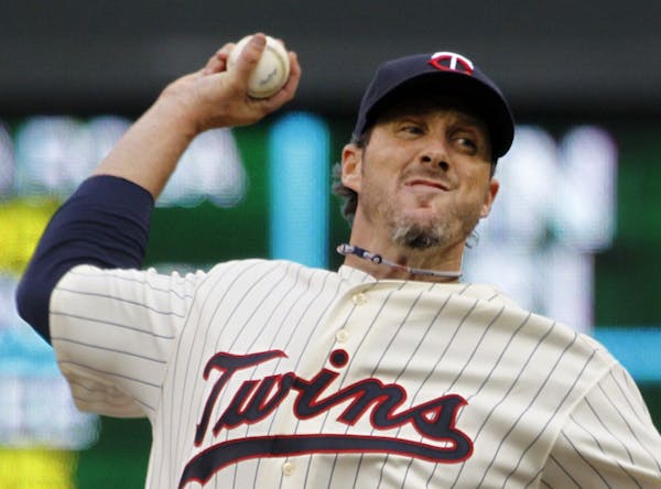 TWINS -vs- OAKLAND OPENING DAY - ] Twins closer Joe Nathan saved the win for the Twins in the 9th inning.