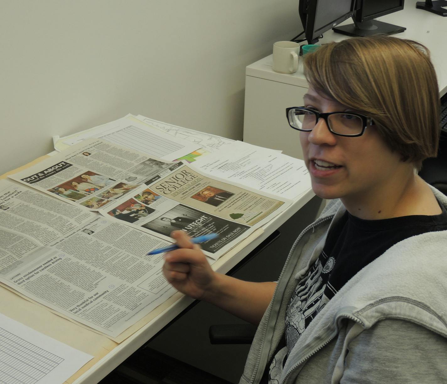 University of Minnesota, Morris senior Natasha Miller works on a content analysis of community newspapers at the Center for Small Towns.