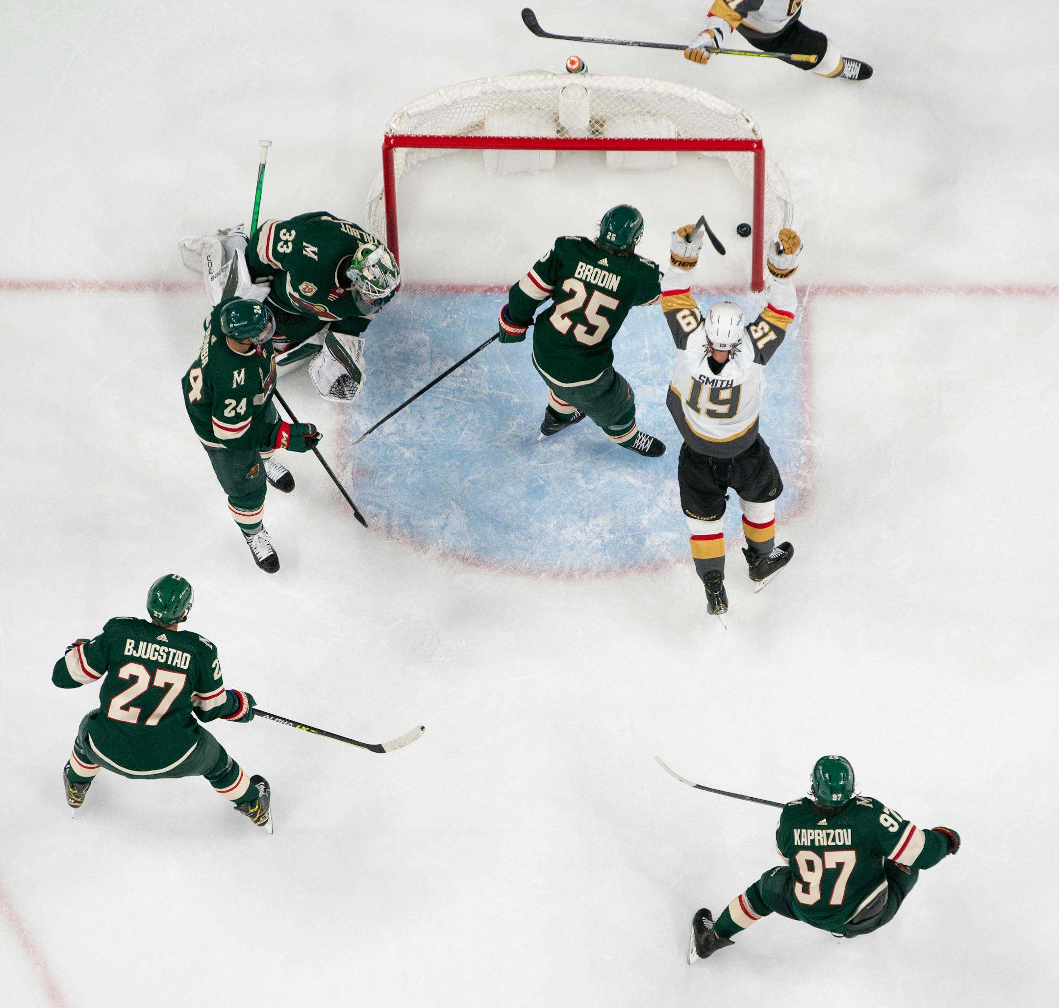 Vegas Golden Knights right wing Reilly Smith (19) slipped the winning goal past Minnesota Wild goaltender Cam Talbot (33) despite the efforts of Wild defenseman Jonas Brodin (25) in the second period.