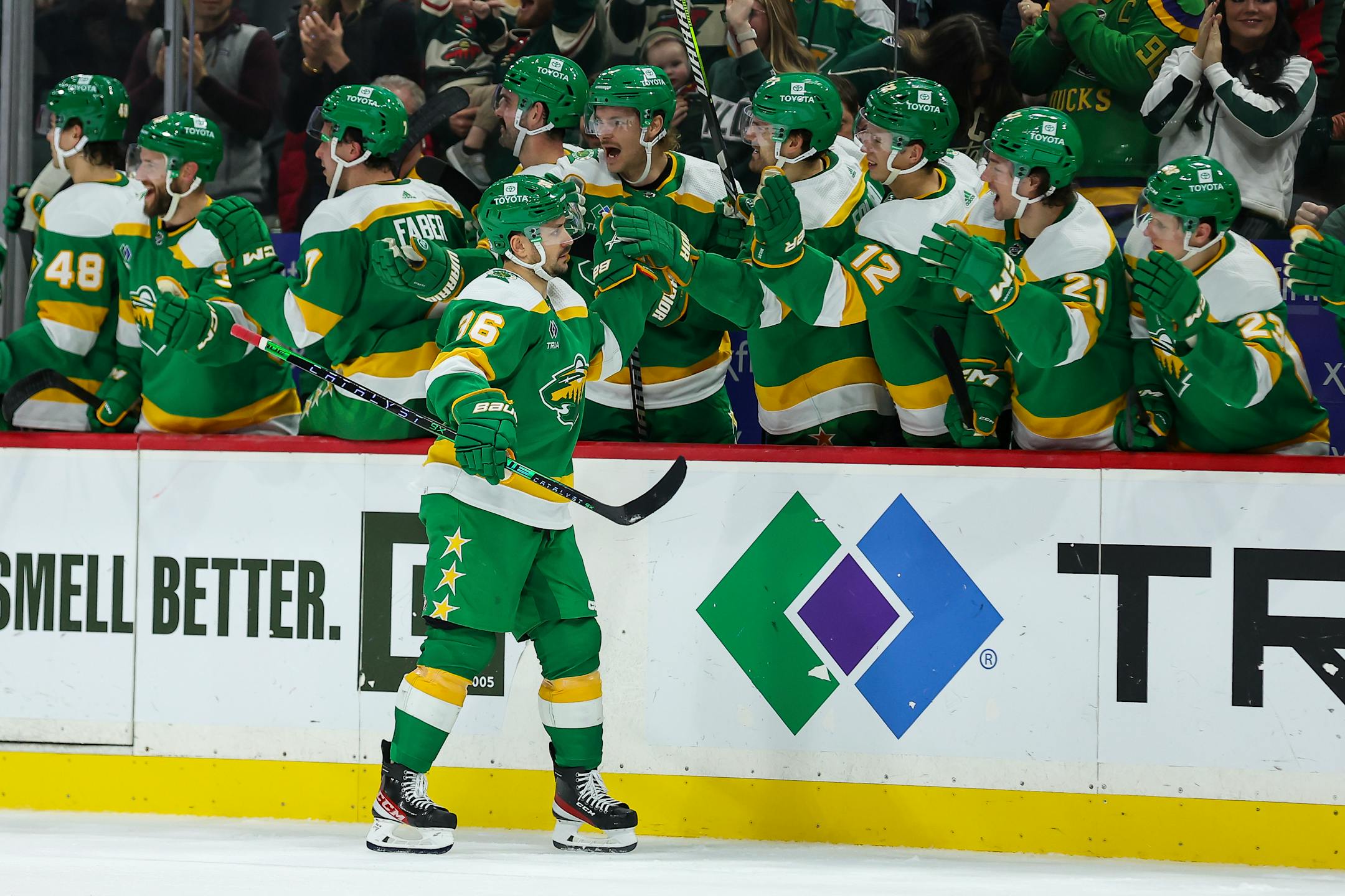 Minnesota Wild right wing Mats Zuccarello (36) is congratulated for his goal during the shootout against the Vancouver Canucks in an NHL hockey game Saturday, Dec. 16, 2023, in St Paul, Minn. (AP Photo/Matt Krohn)