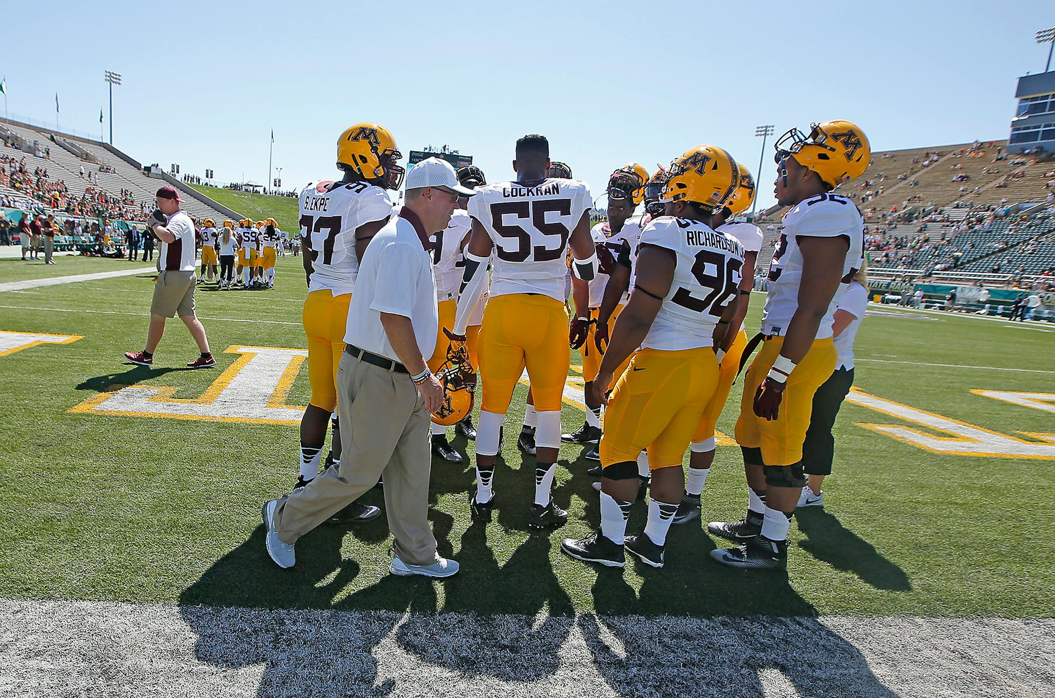 Minnesota head coach Jerry Kill fired up players on the field before they took on Colorado State.