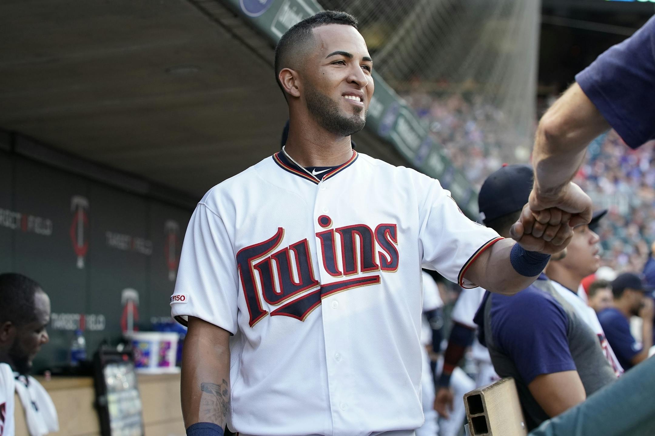 Minnesota Twins left fielder Eddie Rosario (20) celebrates getting a run.