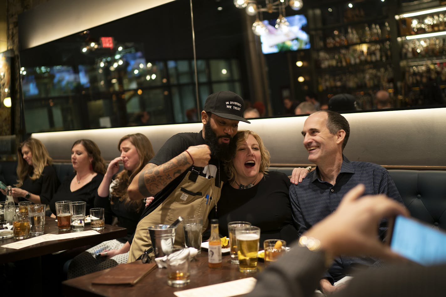 Chef and Top Chef contestant Justin Sutherland goofed off with guests Carolyn Geis and Pat Splinter who asked for a photo with him during a viewing of a recent Top Chef episode at the Handsome Hog in St. Paul, Minn., on Thursday, January 17, 2019. ] RENEE JONES SCHNEIDER &#xa5; renee.jones@startribune.com The restaurant hosted a six course meal before a viewing party of Top Chef, a show that Sutherland is a contestant on.