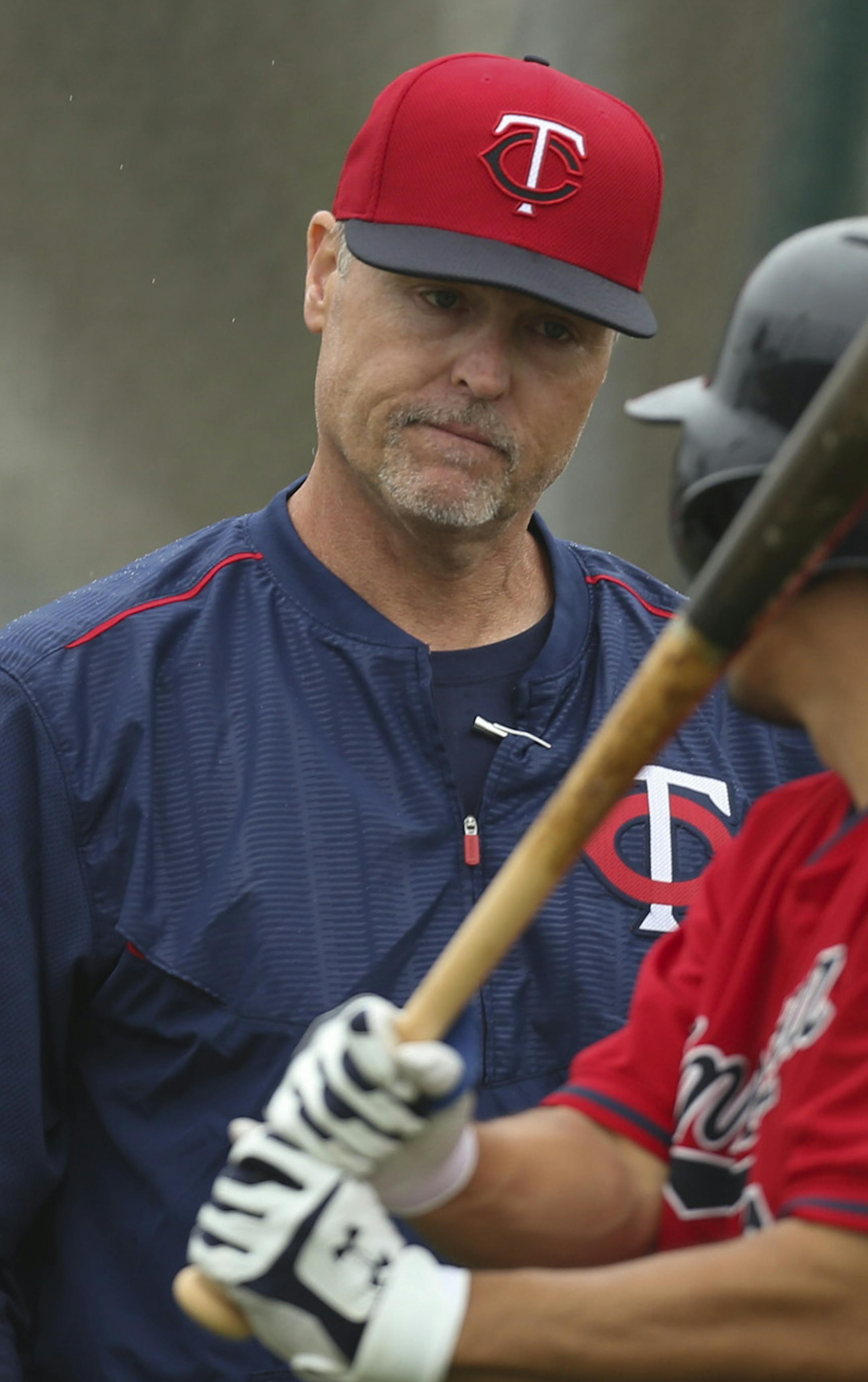 Hitting coach Tom Brunansky talked with catcher Kurt Suzuki during batting practice Thursday morning at Hammond Stadium. ] JEFF WHEELER ï jeff.wheeler@startribune.com Twins pitchers and catchers continued their workouts Thursday morning, February 26, 2015 at Hammond Stadium in Fort Myers, FL.