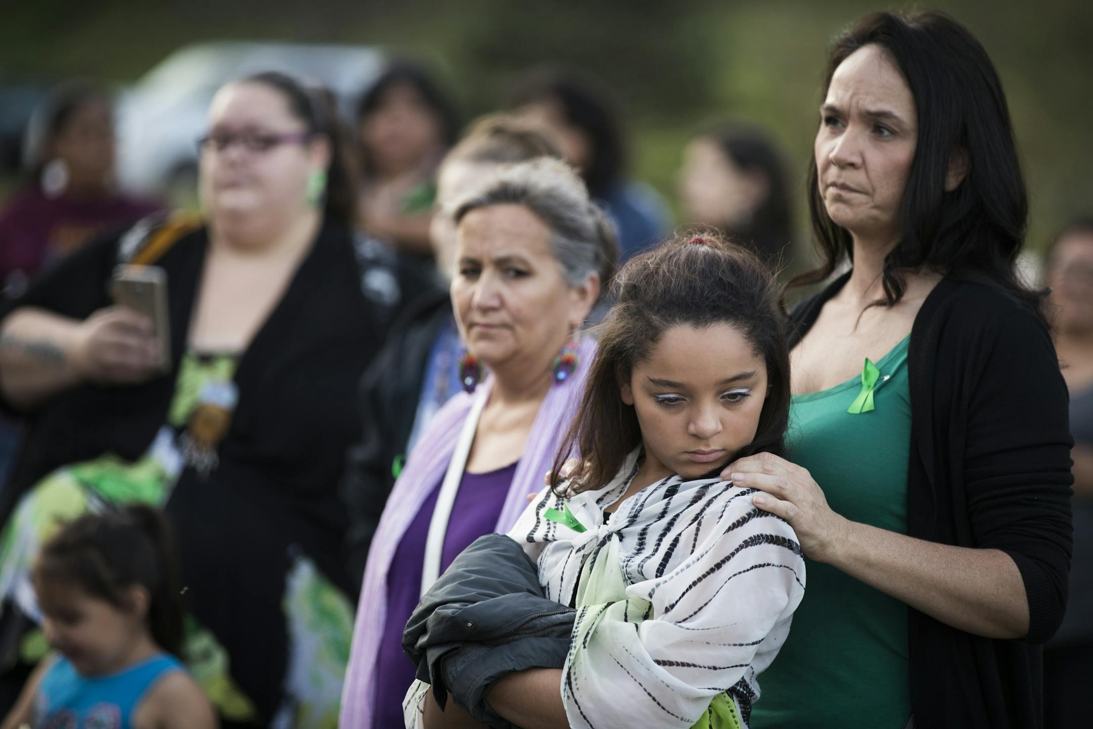 Nicole Matthews, right, of Minneapolis and her daughter Kiora Burgess-Matthews, 13, attend a prayer circle for Savanna LaFontaine-Greywind.