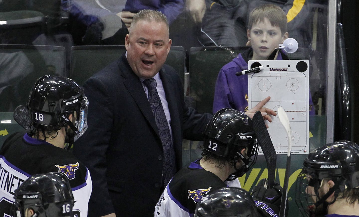 Minnesota State Mankato head coach Mike Hastings talks with his players during the third period of the WCHA Final Five college championship hockey game against Michigan Tech in St. Paul, Minn., Saturday, March 21, 2015. Minnesota State Mankato won 5-2. (AP Photo/Ann Heisenfelt) ORG XMIT: MNAH122 ORG XMIT: MIN1511121743450151