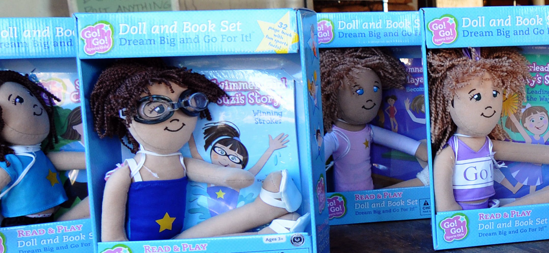 (left to right) Tatum Berliner, 6, and her mother, Shanon, both of Scottsdale, Ariz., look at the Go! Go! Sports Girls books, written by Kara Douglass Thom. Photo by Liz Rolfsmeier, Special to the Star Tribune