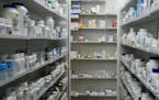 FILE -- Medications line the shelves at Wyckoff's Corner Pharmacy in New York, Jan. 19, 2016. As the 2020 presidential election heats up, politicians 