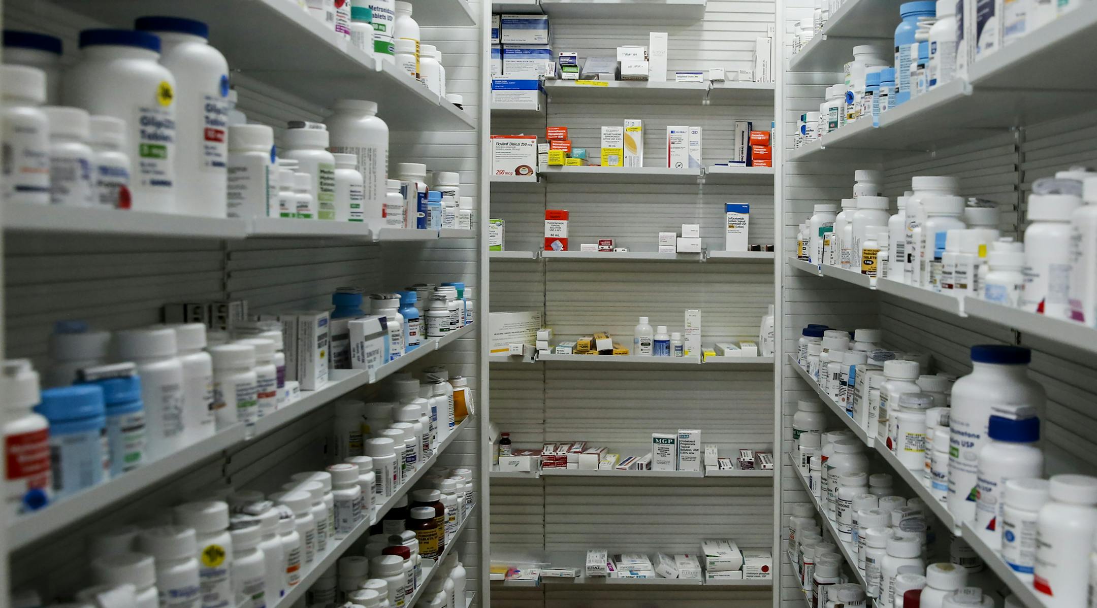 FILE -- Medications line the shelves at Wyckoff's Corner Pharmacy in New York, Jan. 19, 2016. As the 2020 presidential election heats up, politicians from both parties are eager to show they are doing something about rising drug prices, and bipartisan solutions are beginning to take shape. (Nicole Craine/The New York Times)