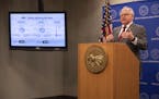 Minnesota Gov. Tim Walz speaks at a news conference inside the Department of Public Safety in St. Paul, Minn., on Thursday, April 30, 2020. Walz unvei