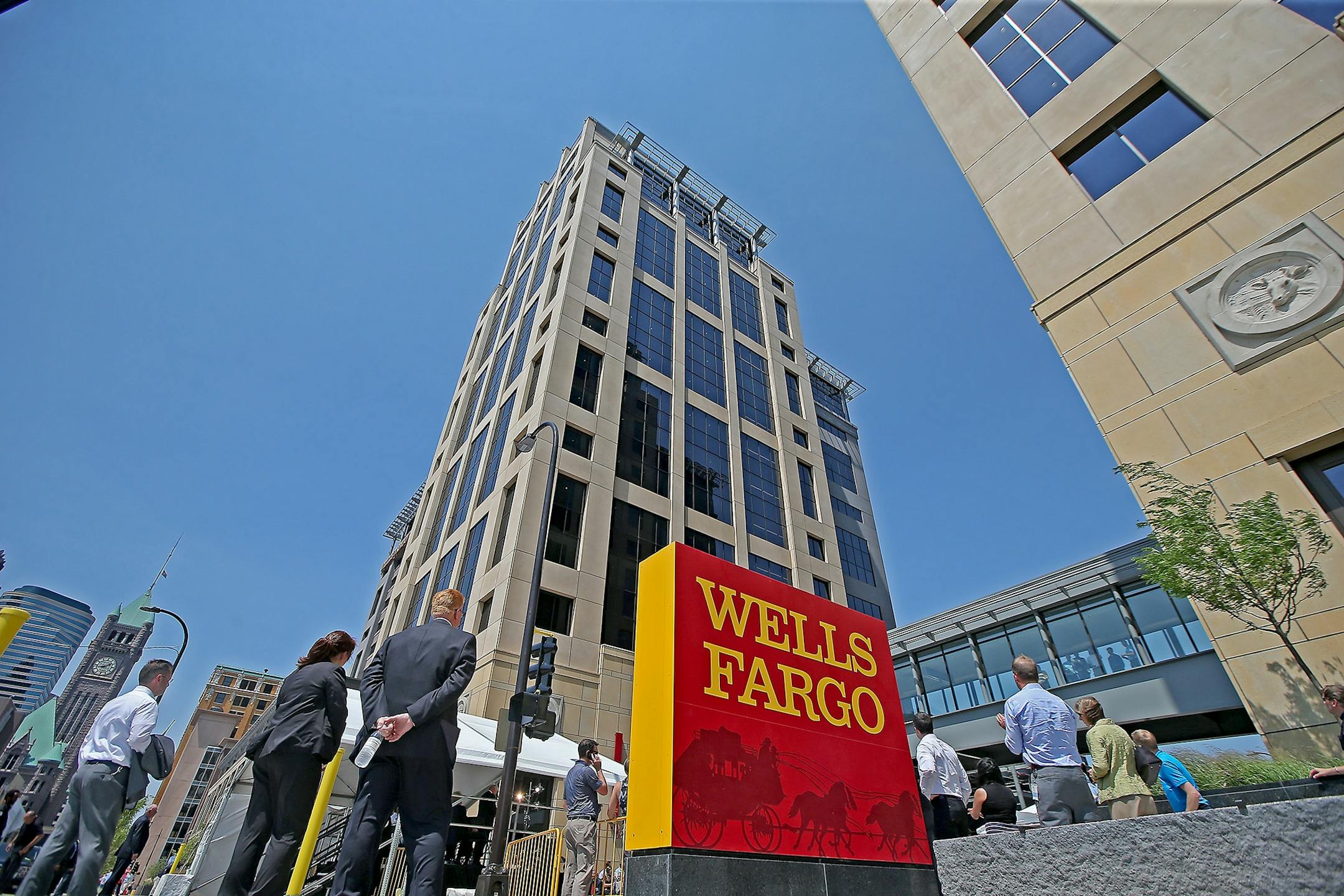 Wells Fargo employees and visitors watched as executives and city officials celebrated the grand opening of Minneapolis East Town Towers, Wednesday, July 20, 2016 in downtown Minneapolis, MN.