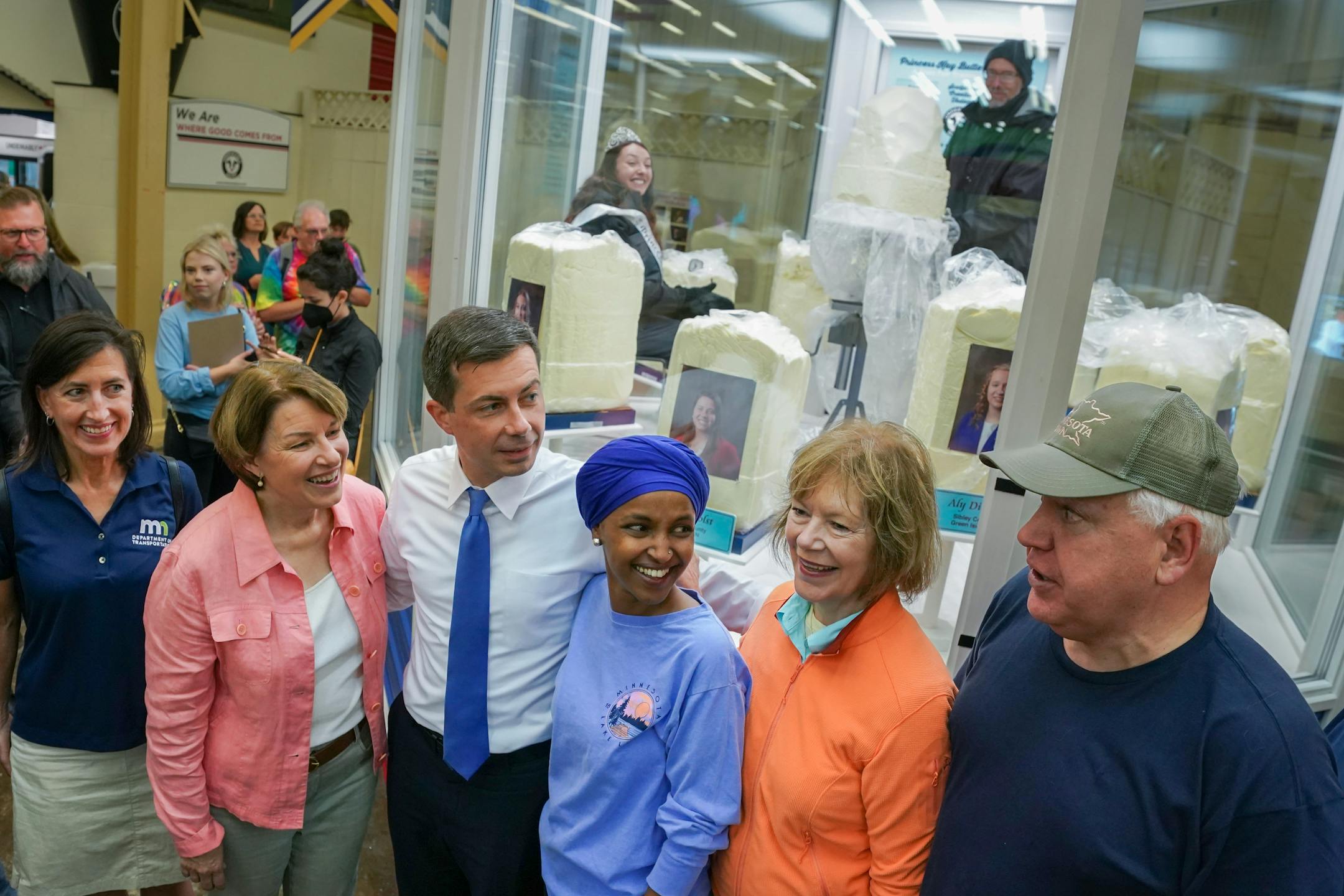 U.S. Transportation Secretary Pete Buttigieg, center, greeted Governor Tim Walz as he toured the Minnesota State Fair with Rep. Ilhan Omar, Sen. Tina Smith and Sen. Amy Klobuchar, on the left is MN Transportation Commissioner Nancy Daubenberger Thursday, Aug. 25, 2022, Falcon Heights, Minn.