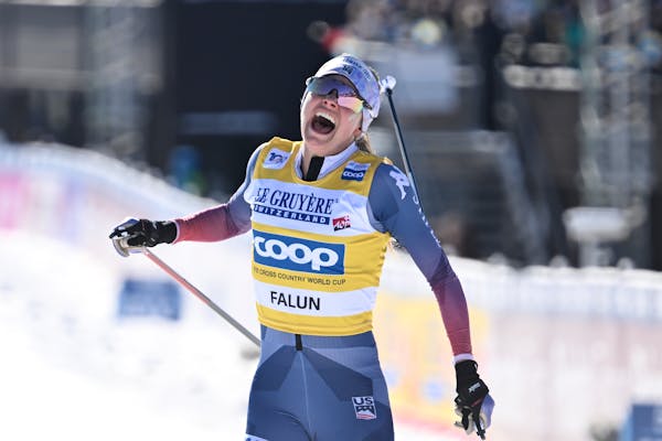 Afton native Jessie Diggins celebrates after winning the 20-kilometer mass start freestyle in Falun, Sweden, on Sunday, becoming the first American to