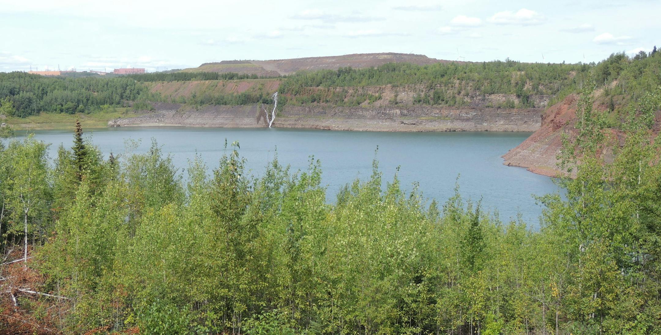 A Mountain Iron park overlooks this iron ore pit on the edge of town. The Minntac taconite mine plant, owned by U.S. Steel Corp., can be seen in the distance.