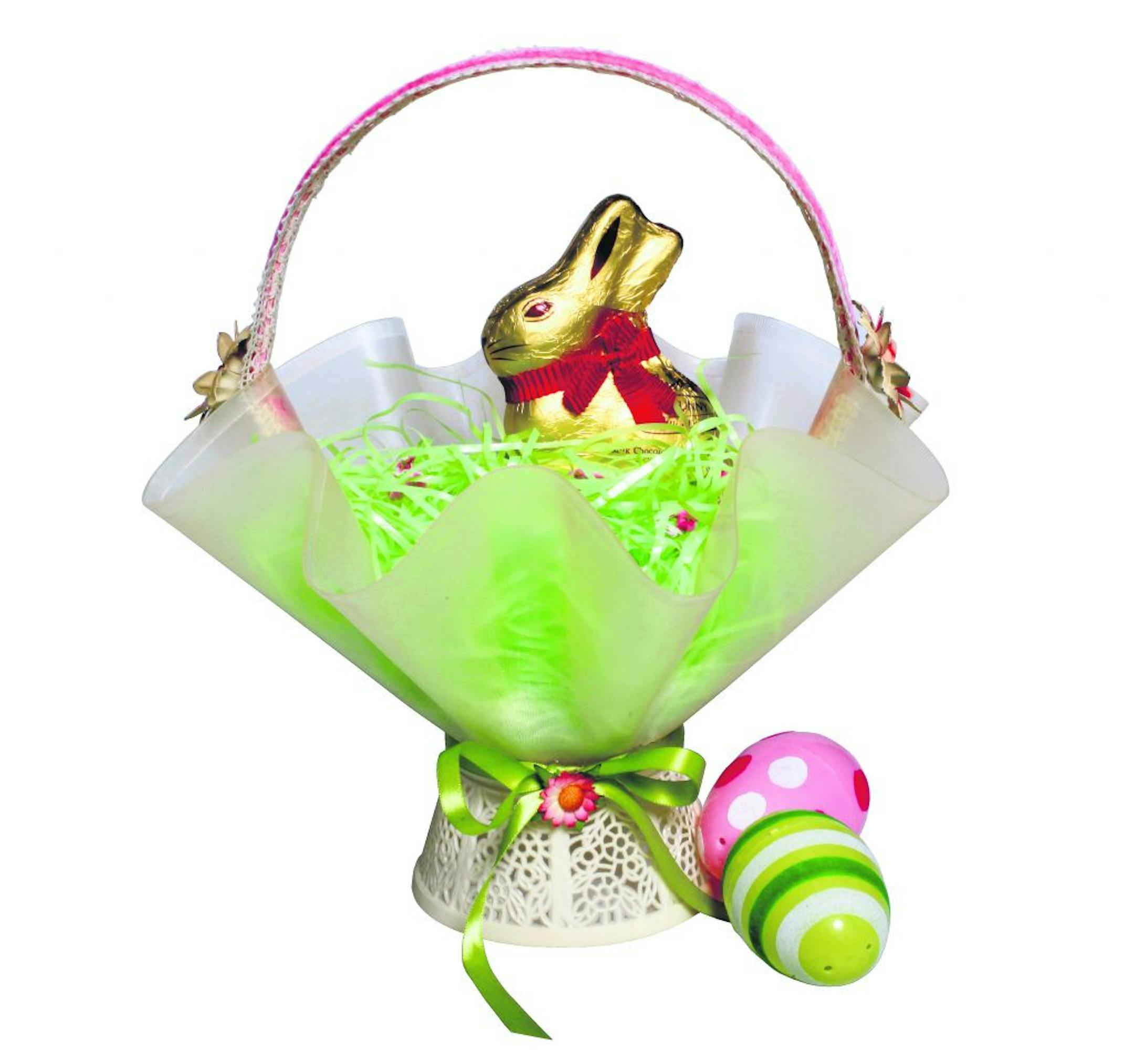 This basket is made from a vintage lampshade, with a headband for a handle and floral curtain tiebacks.