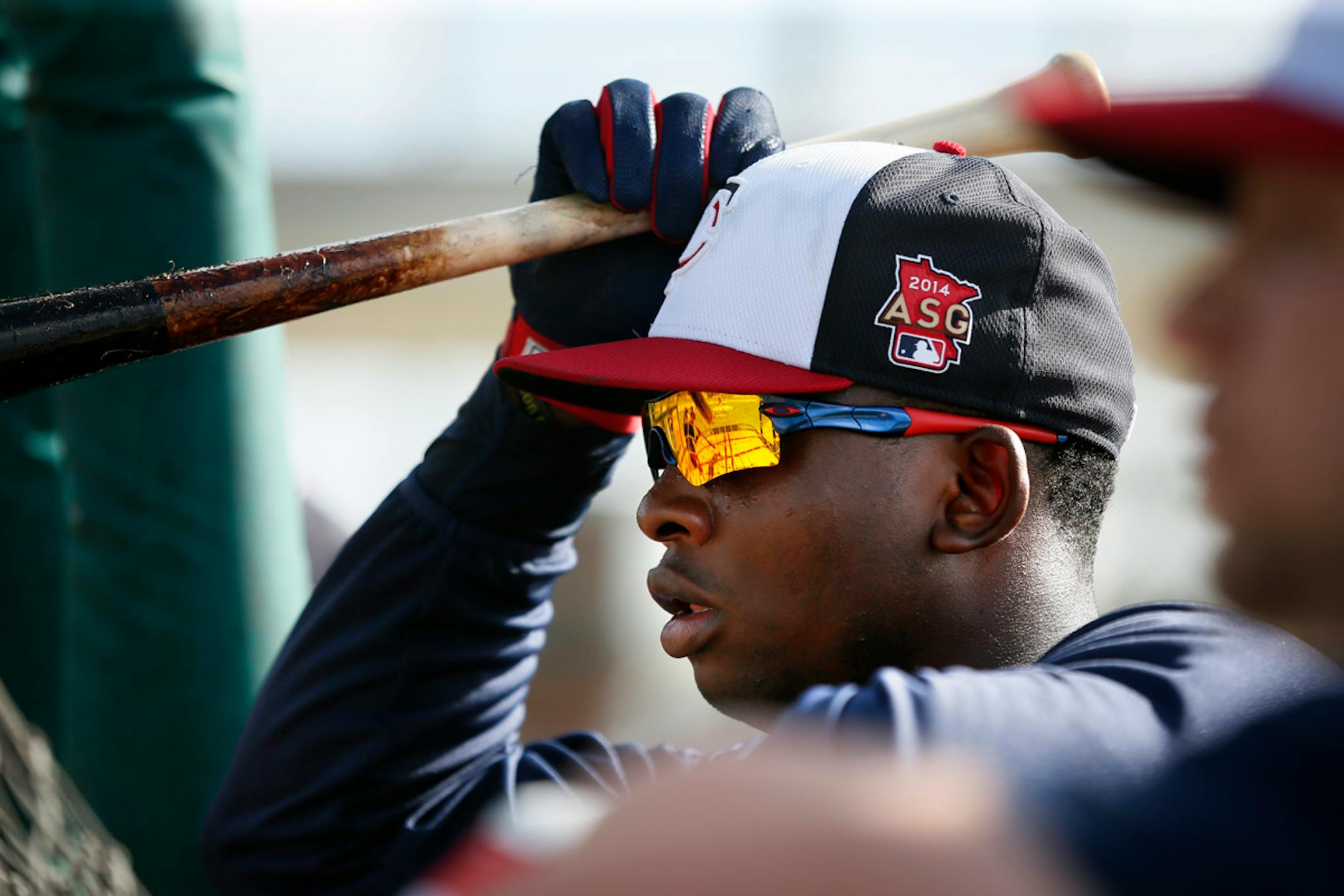 Sano waits his turn to take batting practice at spring training in 2014.