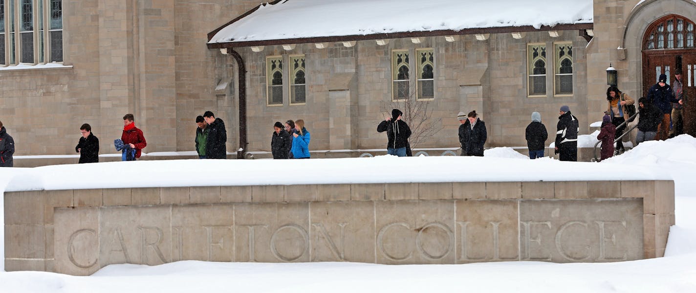 Carleton College students left the Skinner Memorial Chapel after a memorial service for three Carleton College students killed on the icy roads north of Northfield on Friday, The students vehicle collided with a large truck.] Photographed on 3/1/14. Bruce Bisping/Star Tribune bbisping@startribune.com ORG XMIT: MIN1403011528440045