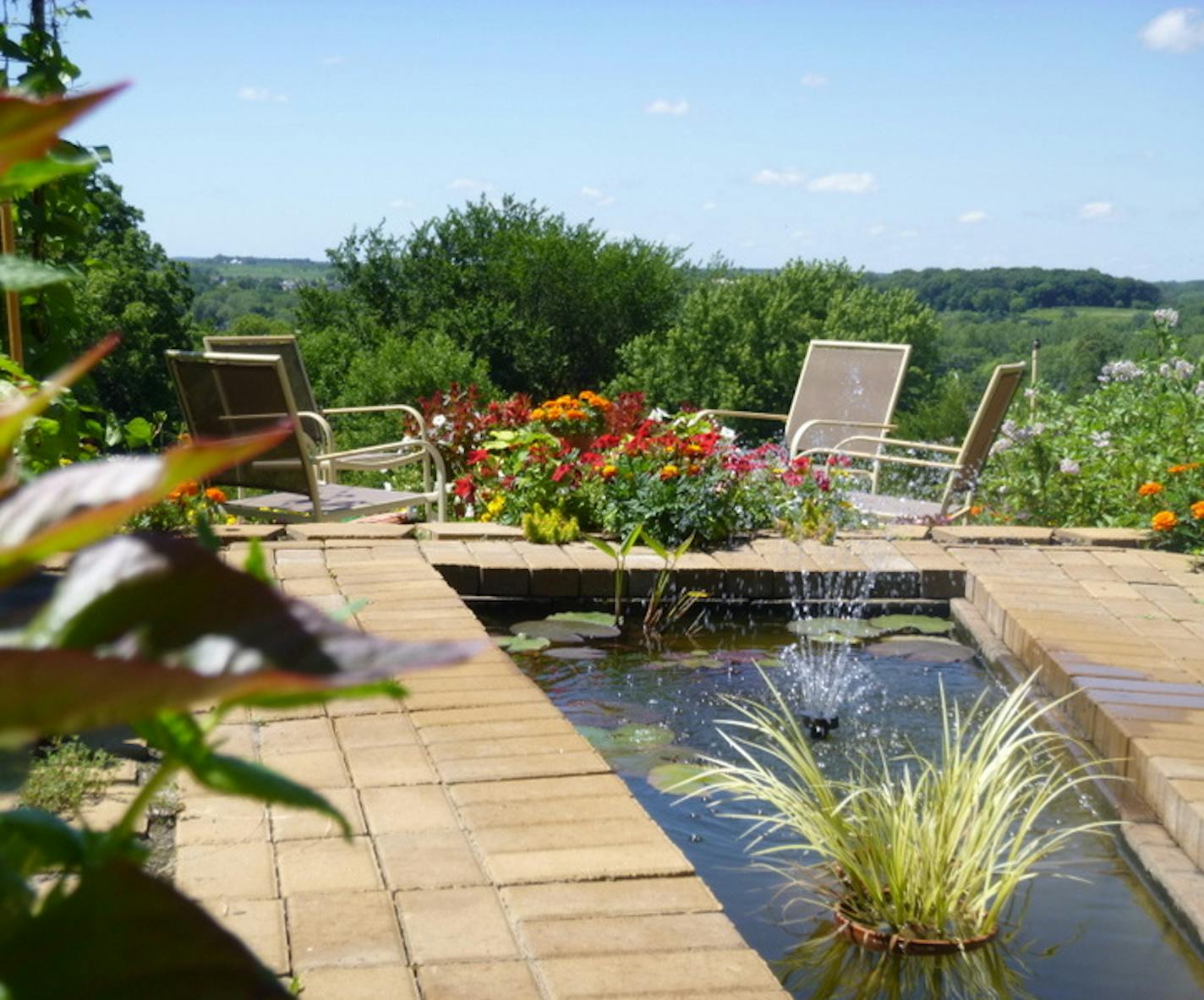 Garden with a view: John and Carrie Duba made the most of their Cannon River Valley views when constructing their garden in Northfield.