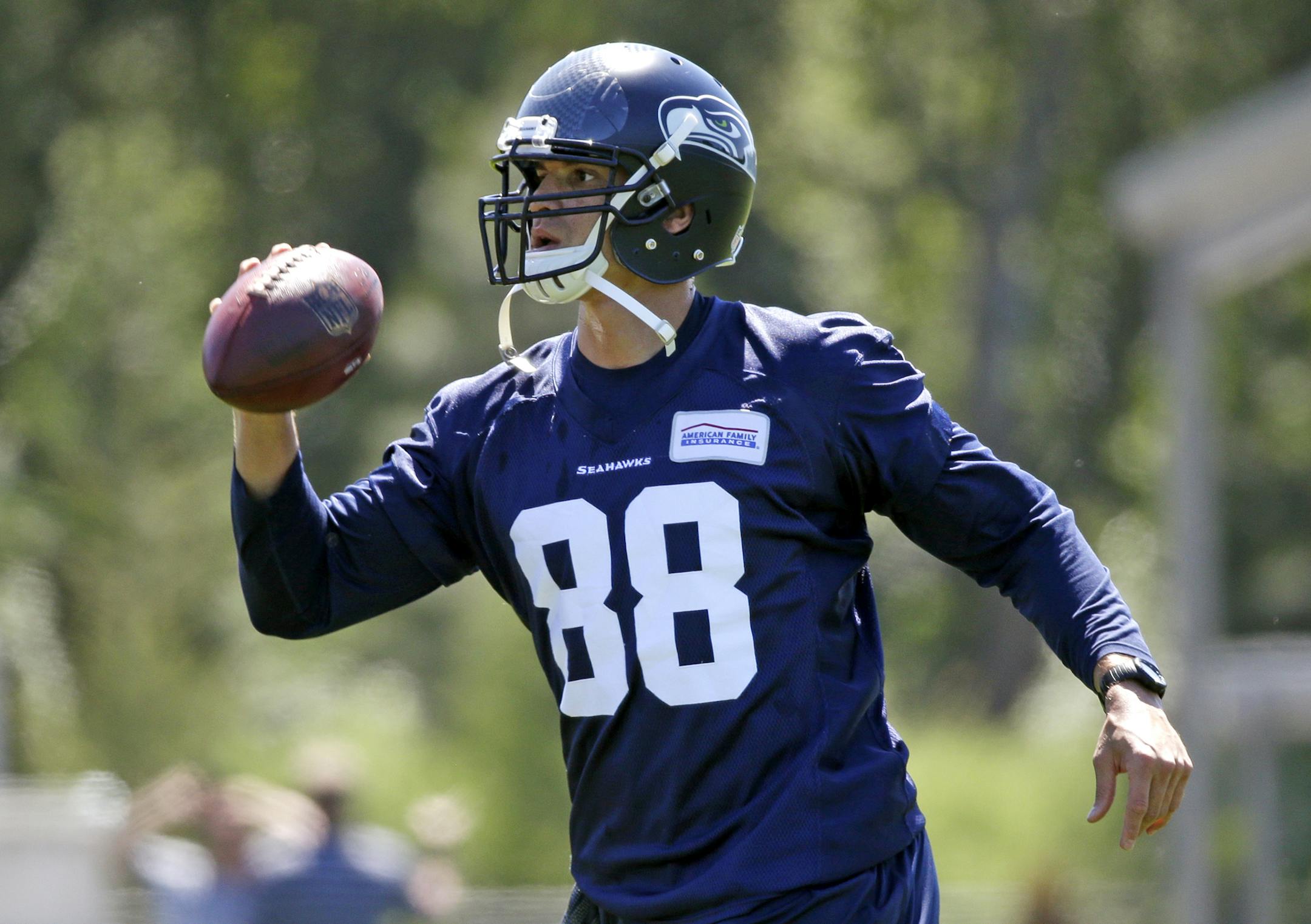 Seattle Seahawks' Jimmy Graham works out during an NFL football organized team activity Tuesday, June 9, 2015, in Renton, Wash. (AP Photo/Elaine Thompson) ORG XMIT: OTK
