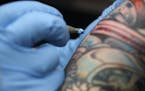JEFF WHEELER • jwheeler@startribune.com HOPKINS - 4/9/09 - A bill working its way through the Minnesota state legislature would regulate tattoo parl