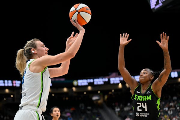 Lynx newcomer Alanna Smith, left, had a career-high 22 points, made three of five three-pointers, and had eight rebounds and four blocks in the Lynx's