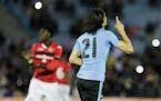 Uruguay's Edinson Cavani celebrates his goal against Trinidad and Tobago during a friendly soccer match ahead of the Copa America Centenario soccer to