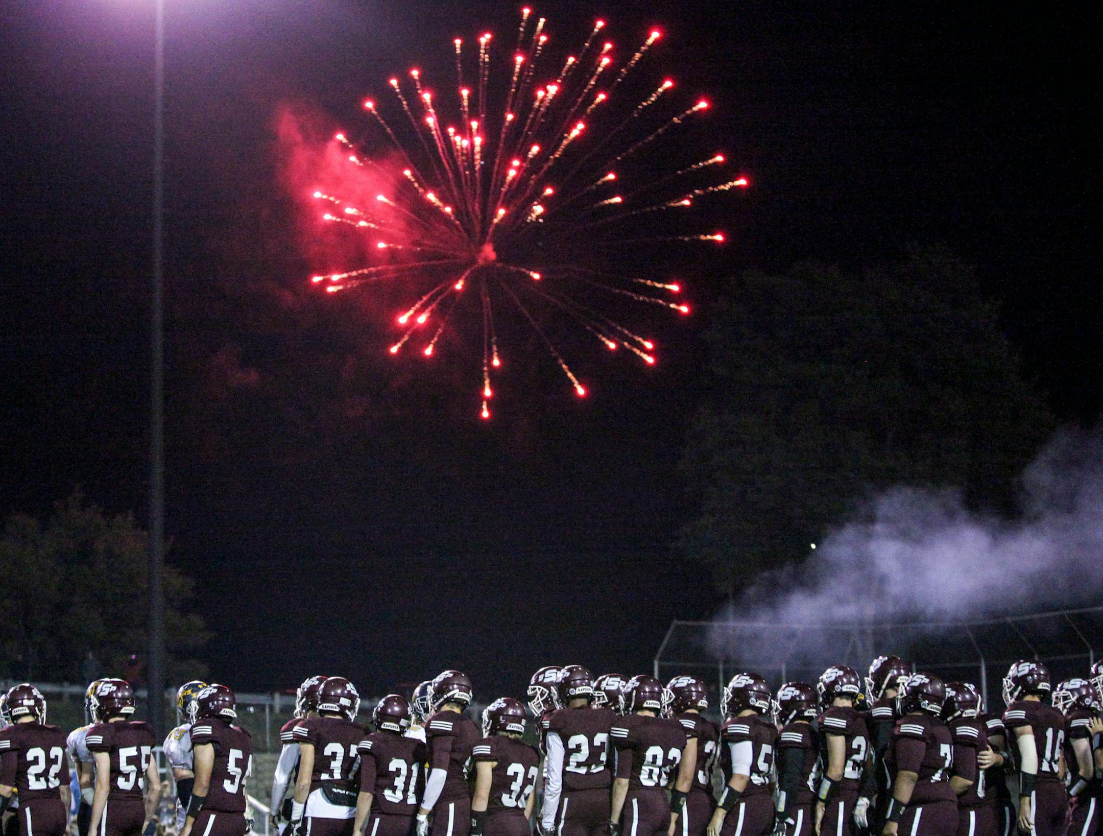 South St. Paul Packers celebrated their win by shooting off fireworks. ] XAVIER WANG ¥ xavier.wtian@gmail.com Game action from a high school football game between Mahtomedi Zephyrs and South St. Paul Packers Friday September 29, 2017 at Ettinger Field in St. Paul