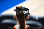 Farmington cheerleaders wore tournament-themed bows in their hair during Wednesday's game.