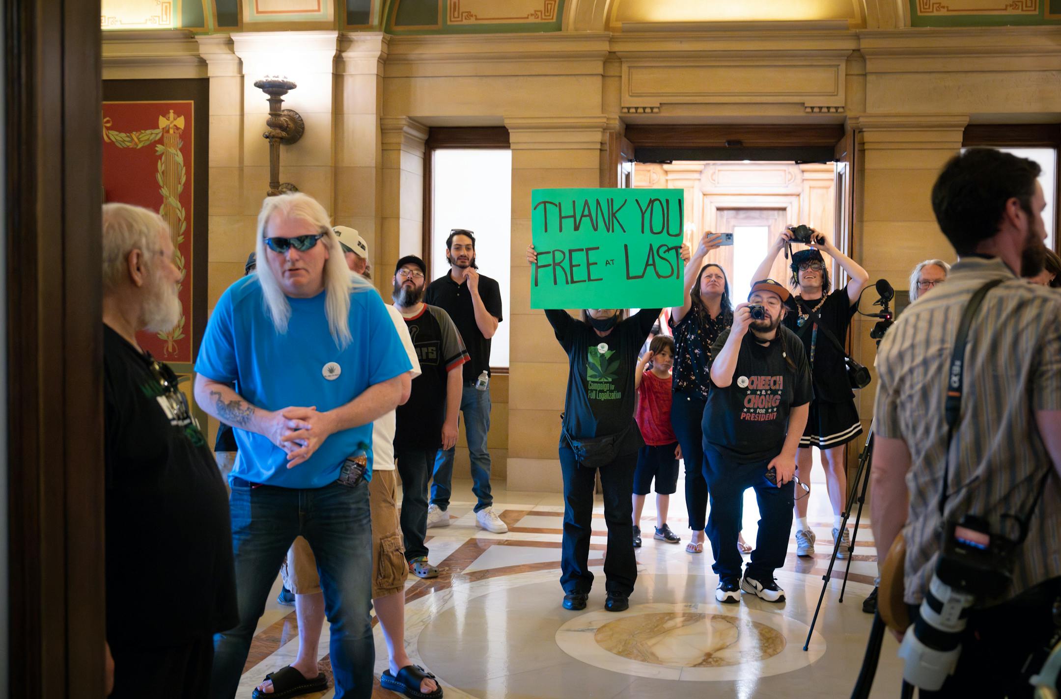 Marijuana supporters waited outside the Governor's Reception Room as the bill was signed Tuesday, May 30, 2023 St. Paul, Minn. Former Governor Jesse Ventura was on hand as Gov. Tim Walz legalized marijuana in Minnesota with the stroke of a pen on Tuesday. ] GLEN STUBBE • glen.stubbe@startribune.com