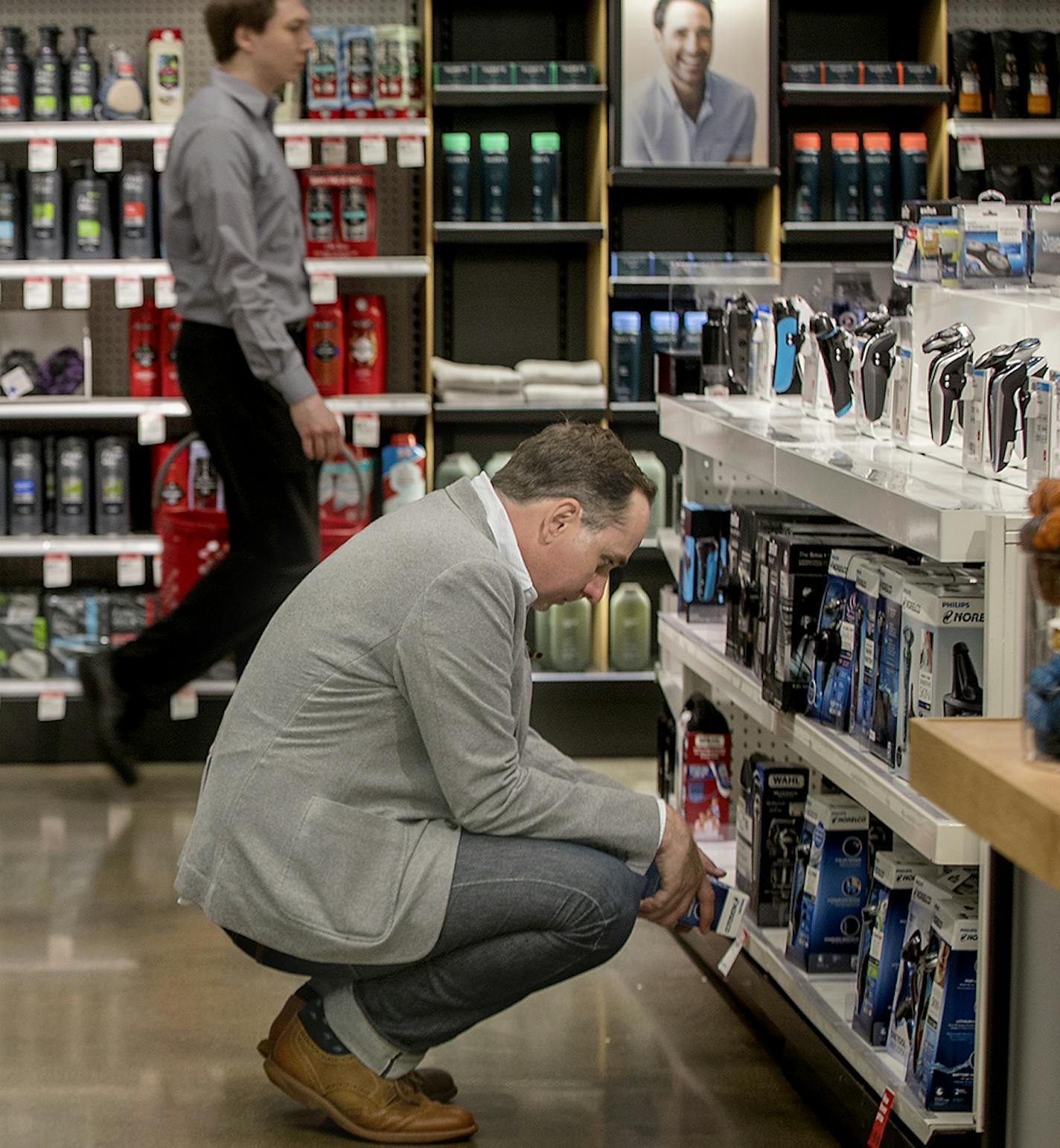 Male Target customers shop the new health section devoted to men at the downtown location, Wednesday, May 30, 2018 in Minneapolis, MN.. Target has been giving its beauty aisles a major makeover both physically and digitally and in terms of the brands it now carries there. ] ELIZABETH FLORES &#xef; liz.flores@startribune.com